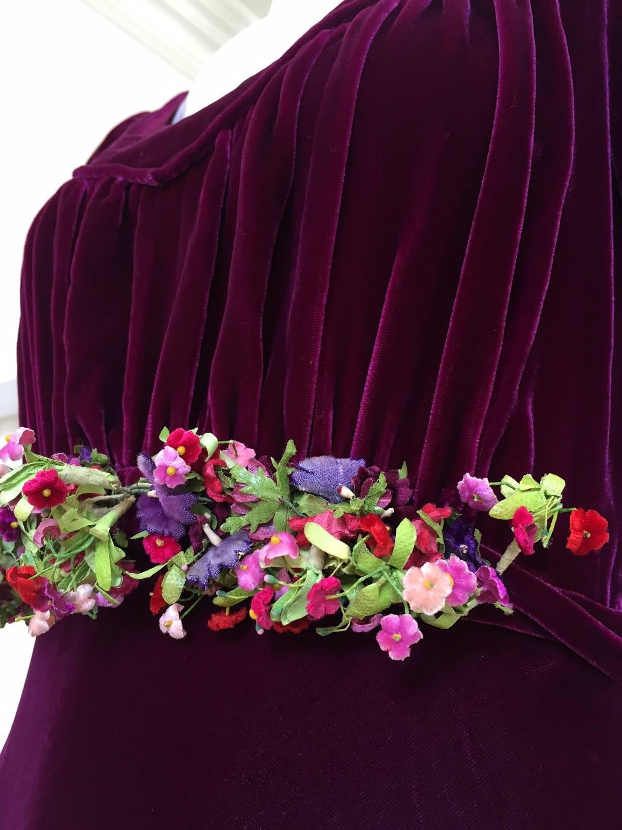 1930s Maroon silk velvet gown with floral applique.
Bust: 34