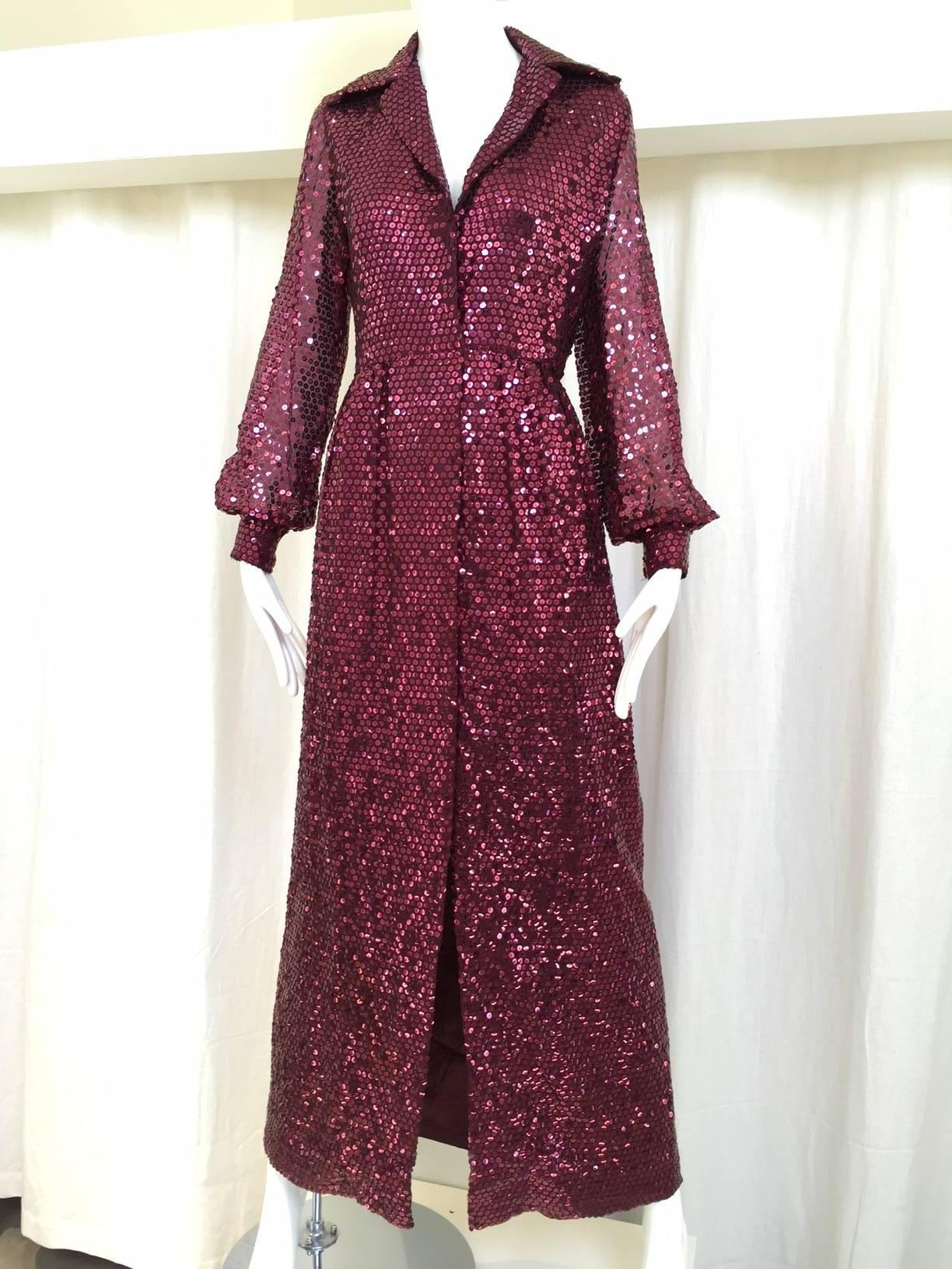 1970s Oscar De La Renta maroon sequin shirt dress.
Bust: 36