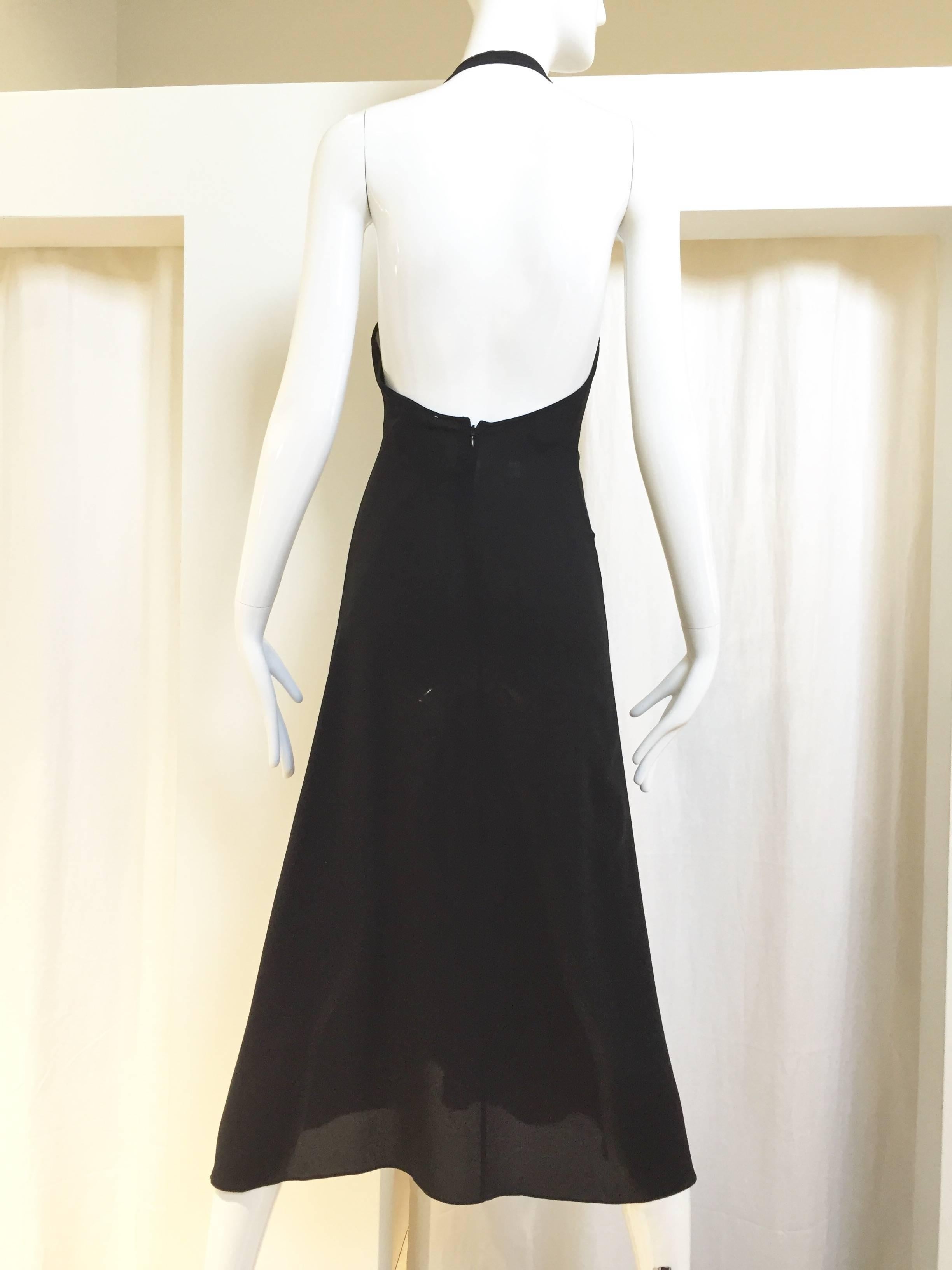 2000s CELINE by michael kors timeless black halter cocktail dress.
Size: 36f