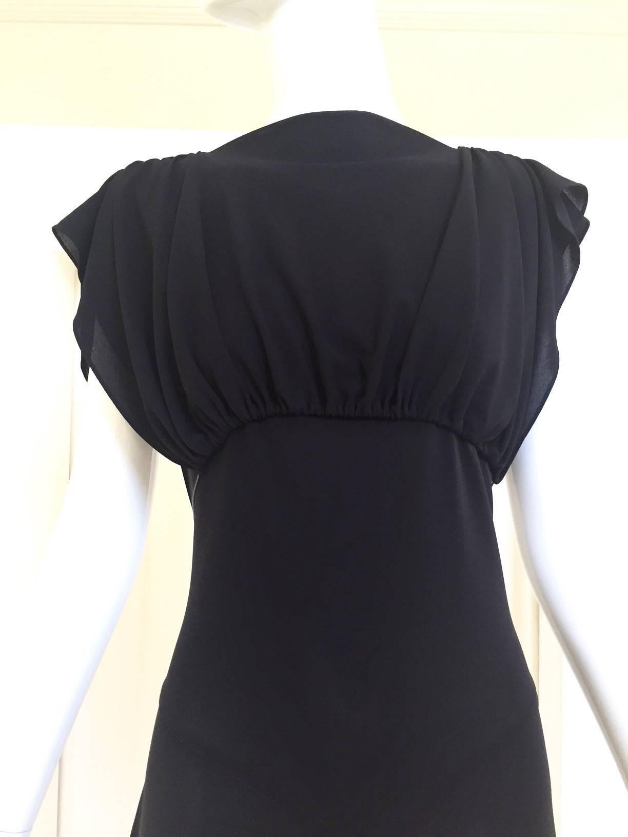 Alaia black rayon dress tie at the back. adjustable waist. lace up with thin leather.
marked size: 42