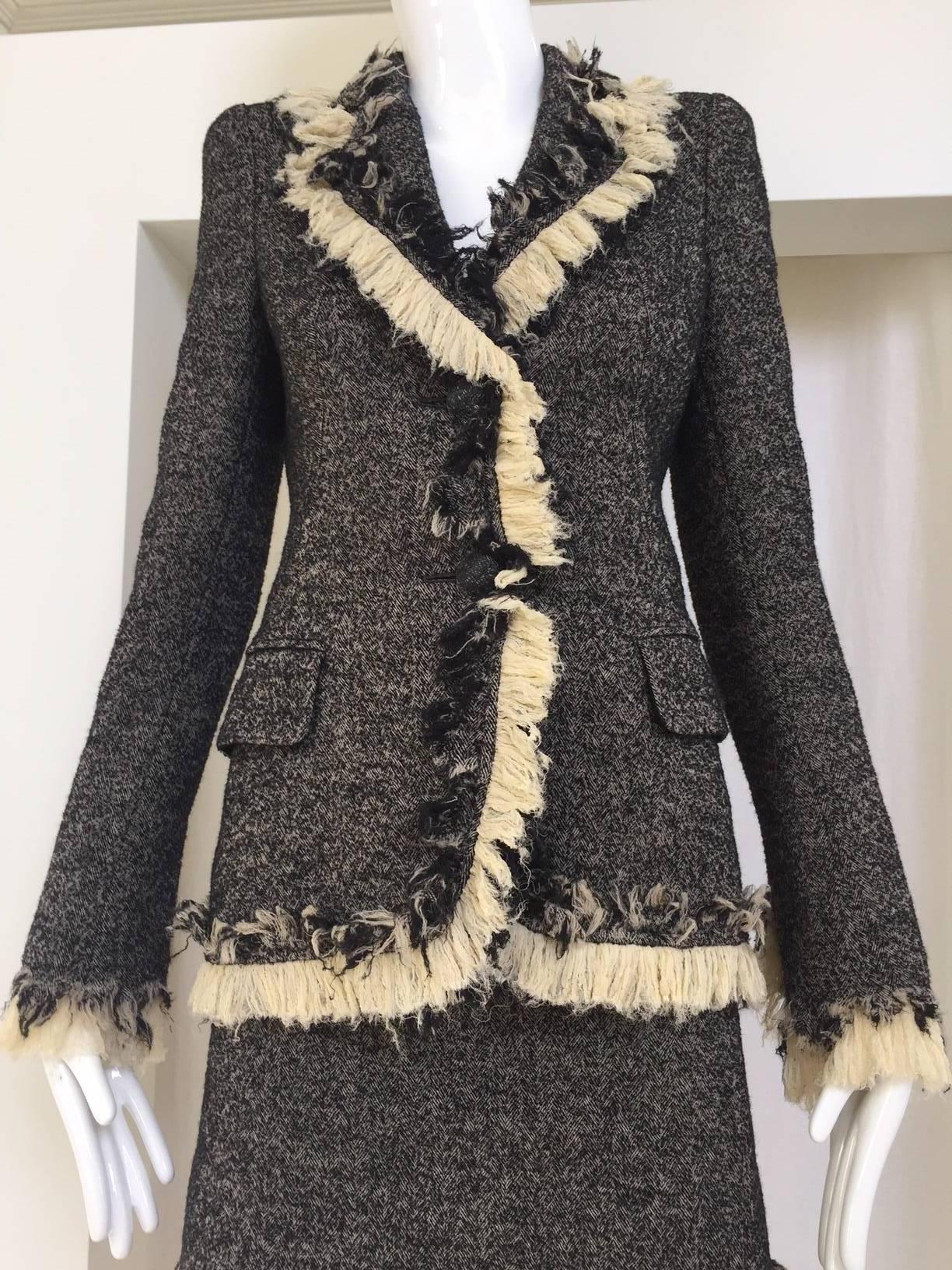 2000s Alexander Mcqueen wool fitted blazer and pencil skirt set.  size: 38
Fit best for US 2
Measurement taken with blazer closed:  Bust: 32