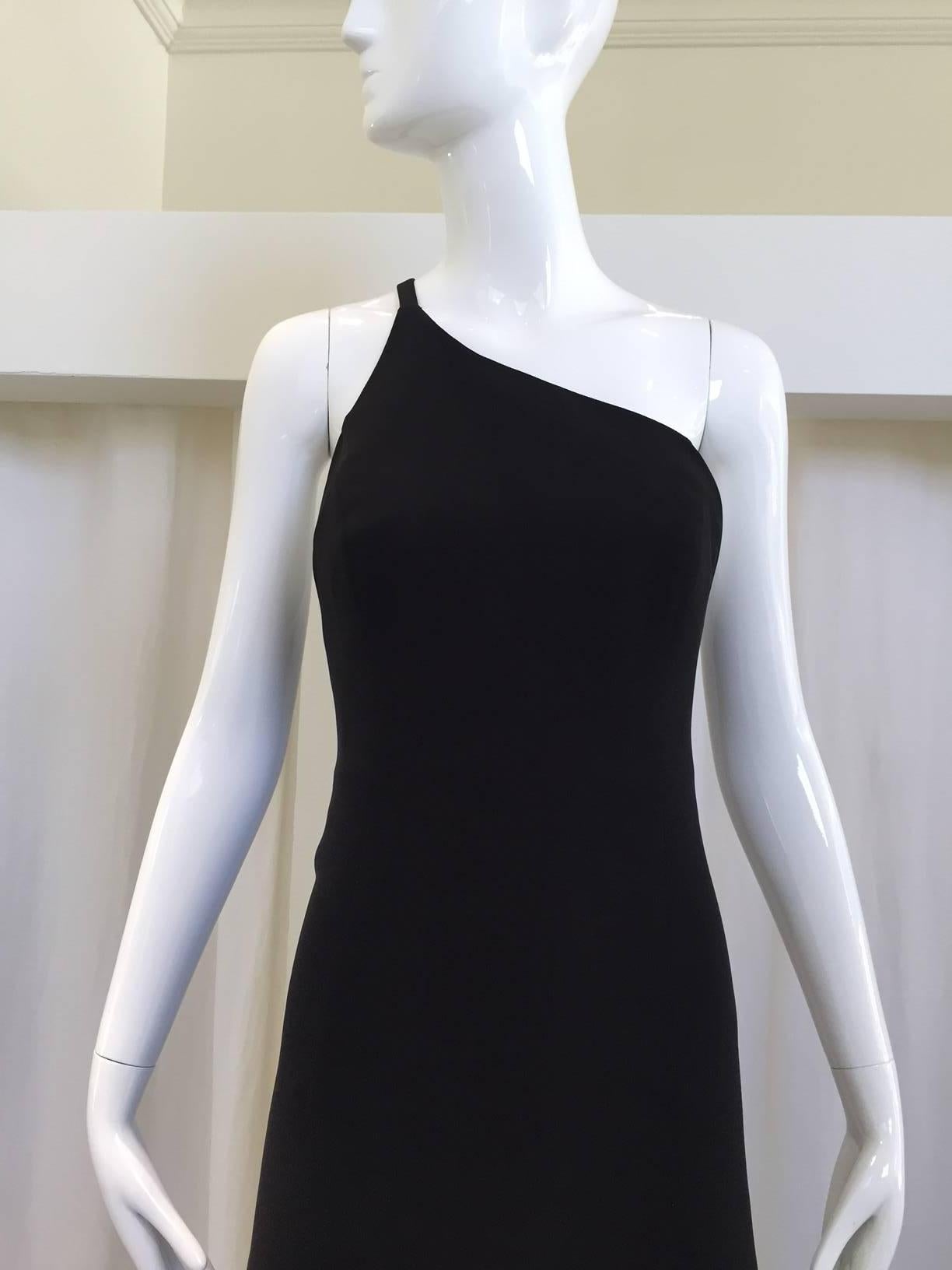 Timeless Giorgio Armani black silk asymmetrical neckline dress.
Bust: 32