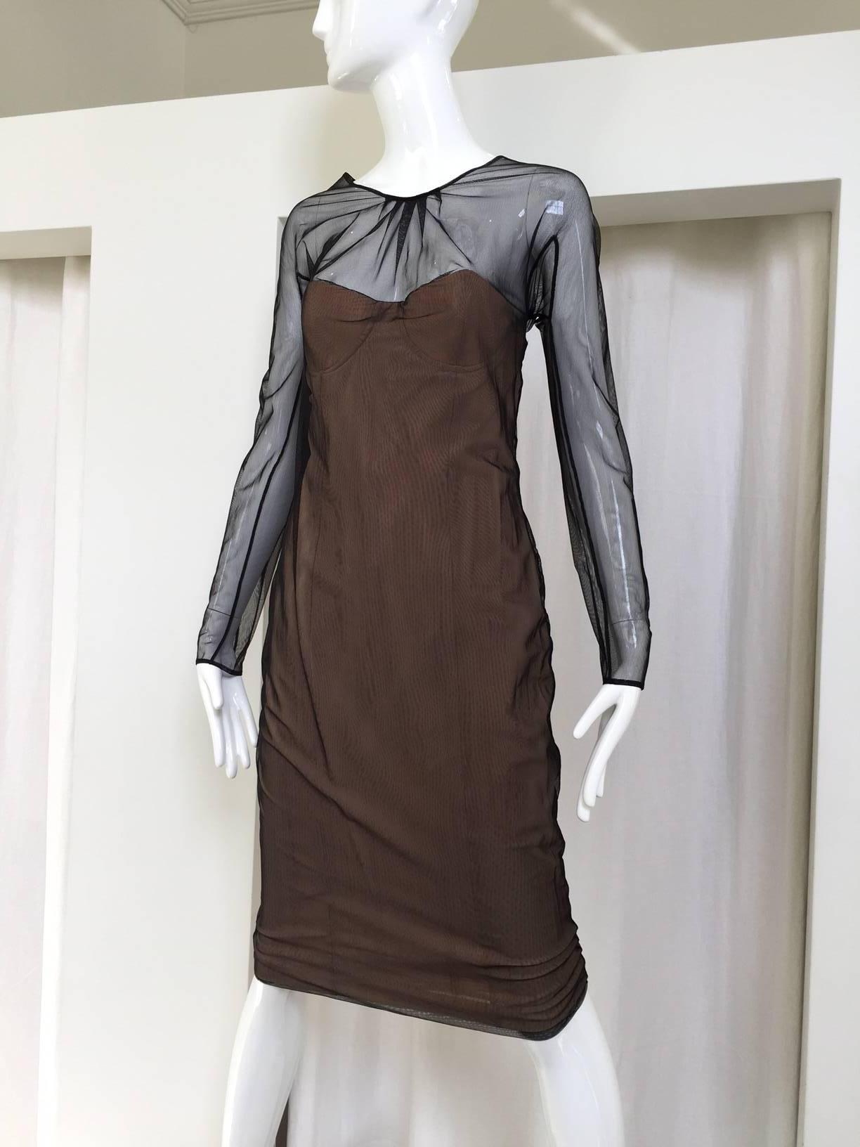  sexy vintage dress designed  by  Tom Ford for GUCCI in 2001. ( see runway picture)
sheer black mesh overlay with corset strapless nude fabric inside. V back. ask for more picture. Marked size: 46IT
fit more size 6 or 8 ( fabric stretch) 
Bust: 36