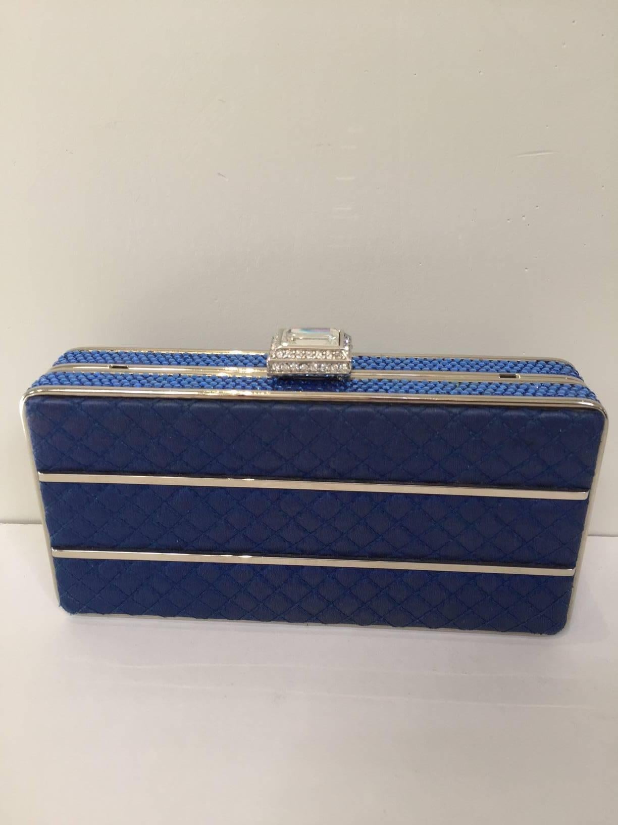 Judith Leiber evening blue satin clutch with rhinestones and strap.