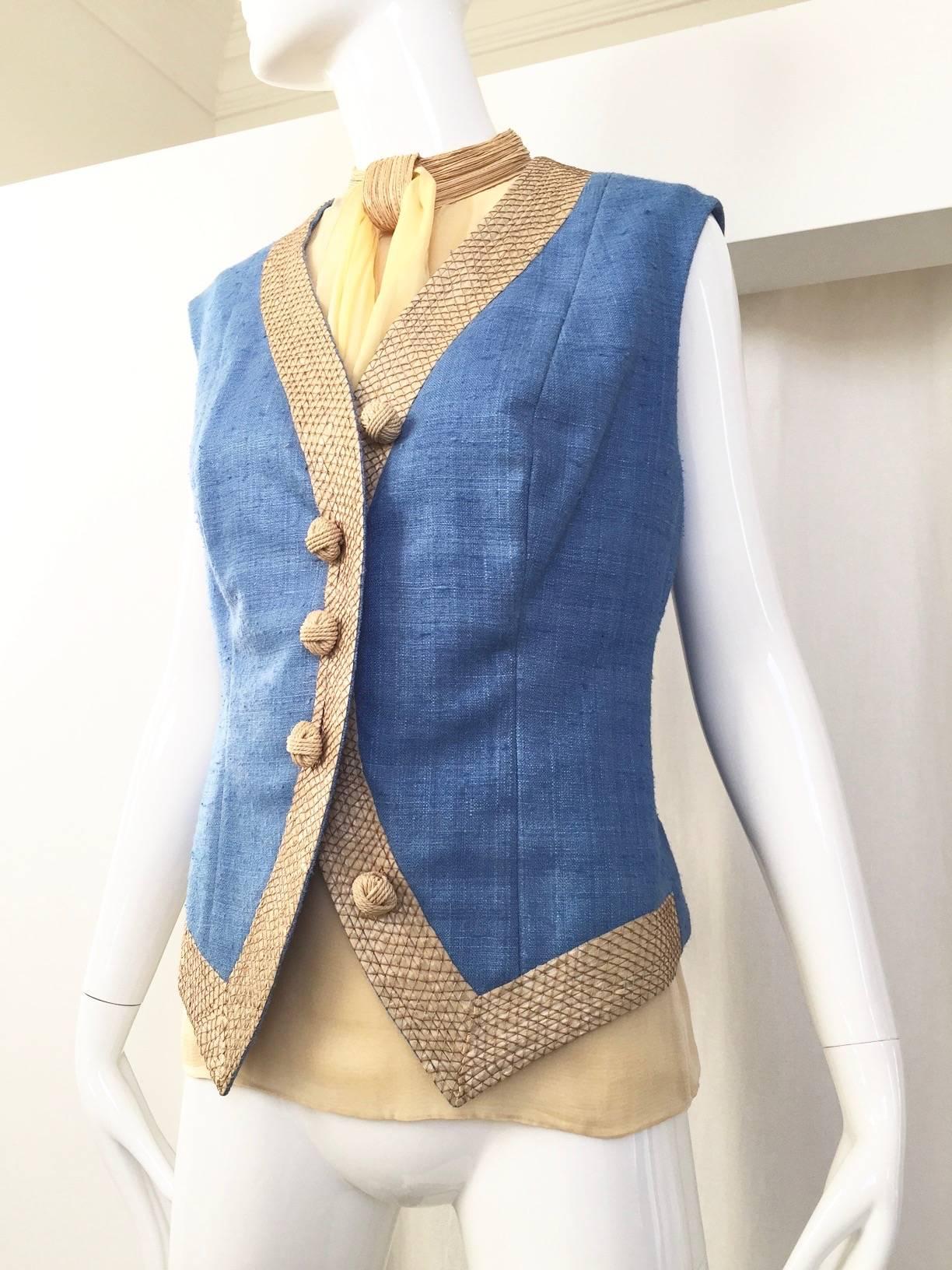 1970s Christian Dior Haute Couture Linen vest  ensemble twith silk blouse. 
Linen Vest linen mix with raffia trim and button. This is 2 piece set.  size: 6/8
Vest : Bust 38"/ Waist: 36"/ hip: 42"/ Length: 22"
Blouse: Bust: