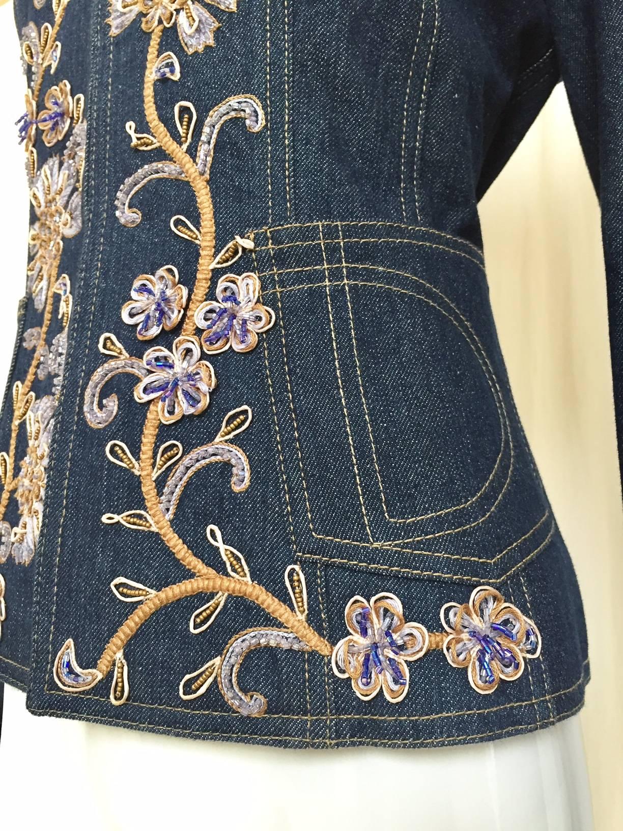 Christian Dior by John Galliano denim embroidered fitted jacket.
B: 36"/ W: 31"/ Hip: 39"/ Sleeve length: 25"/ Jacket length: 21"
Jacket is in excellent condition lined in silk.