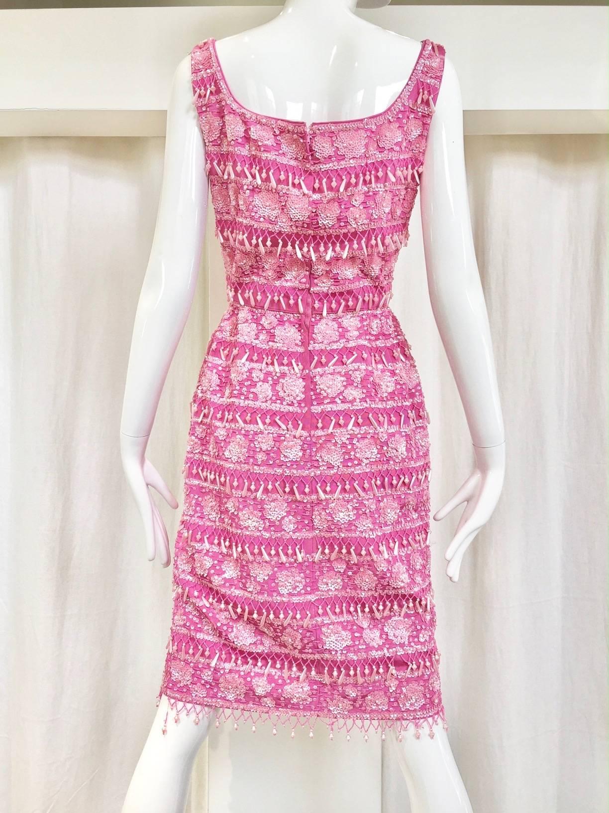  Vintage 1950s pink sheath dress with sequins and some beads.  Size: 2/4 SMALL.
 Perfect summer cocktail party dress.
Bust: 34