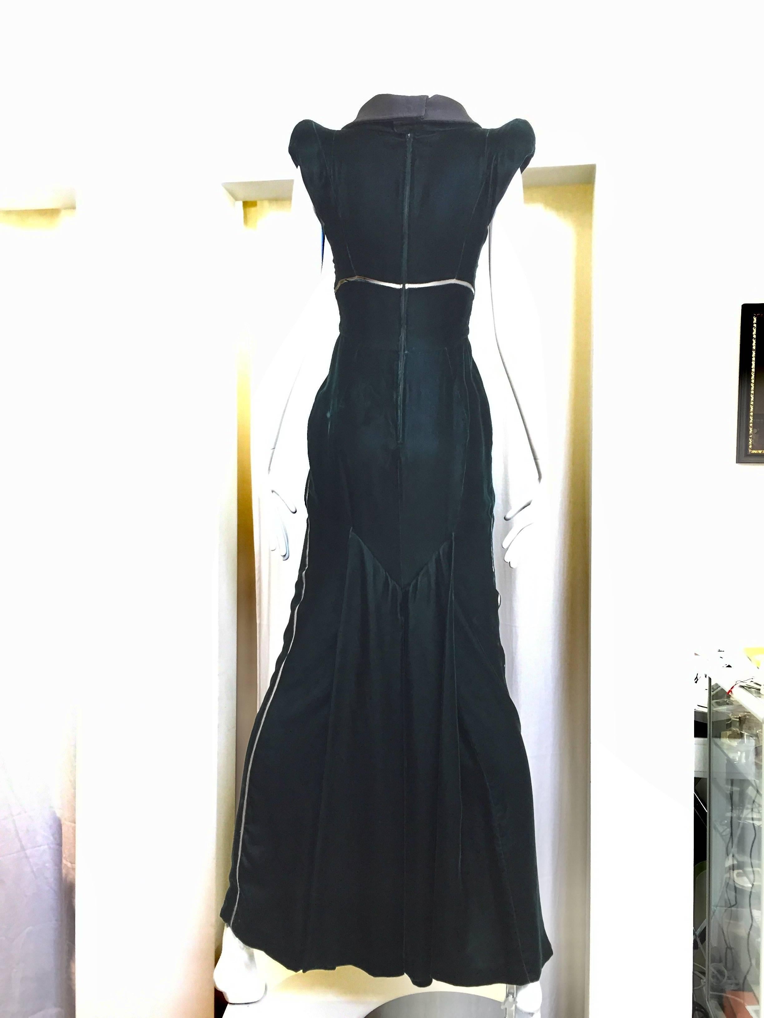 STUNNING  Gianfranco Ferre dark forest green velvet Long evening gown with unique black matte silk rolled collar neckline. Small light shoulder pads, back zipper  and banded cream knit Insets down each Side. This Magnificent gown is also Fully