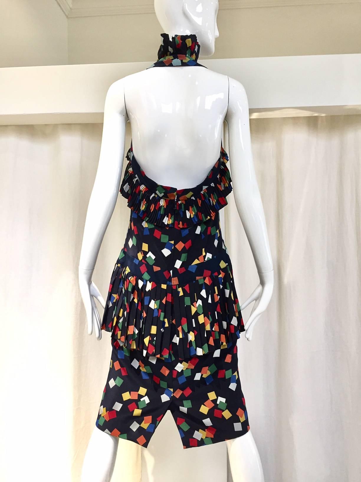 Sexy and chic 80s CHLOE navy blue, orange, red, white and red confetti print silk  halter ruffle dress.  made in france.
Size 4/6/ Small - medium