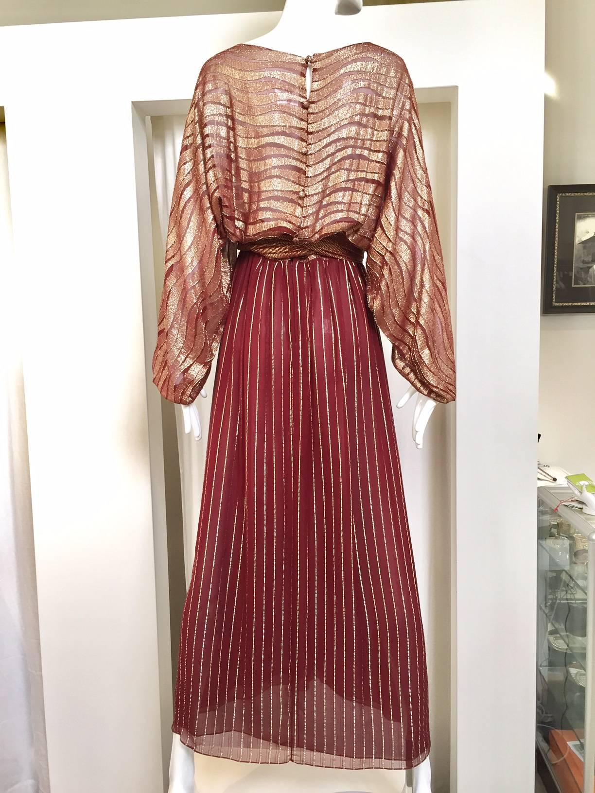 1970s Bill Blass burgundy metallic silk maxi dress with sash. 
Fit Size : 4 / Small
Bust: 38 / Waist: 26.5