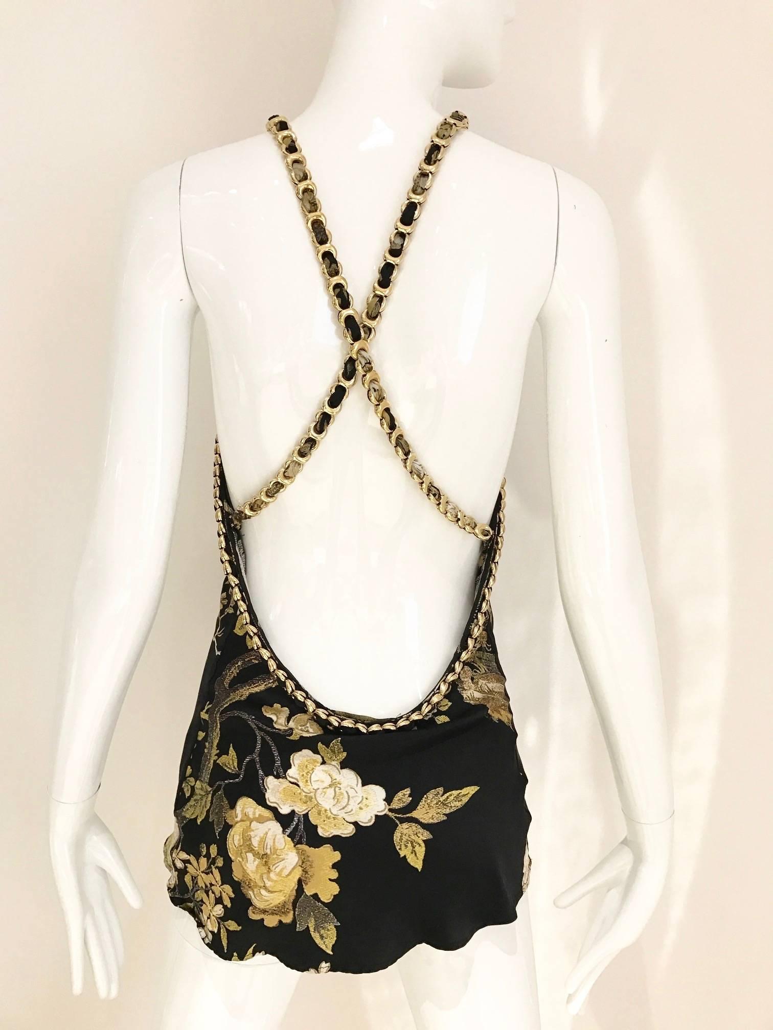 Beautiful silk charmeuse print roberto Cavalli Halter top in gold chain strap with exposed bare back. 
Fit size 4/ SMALL
Bust: 34 inch

***All Clothing has been professionally Dry Cleaned and ready to wear.