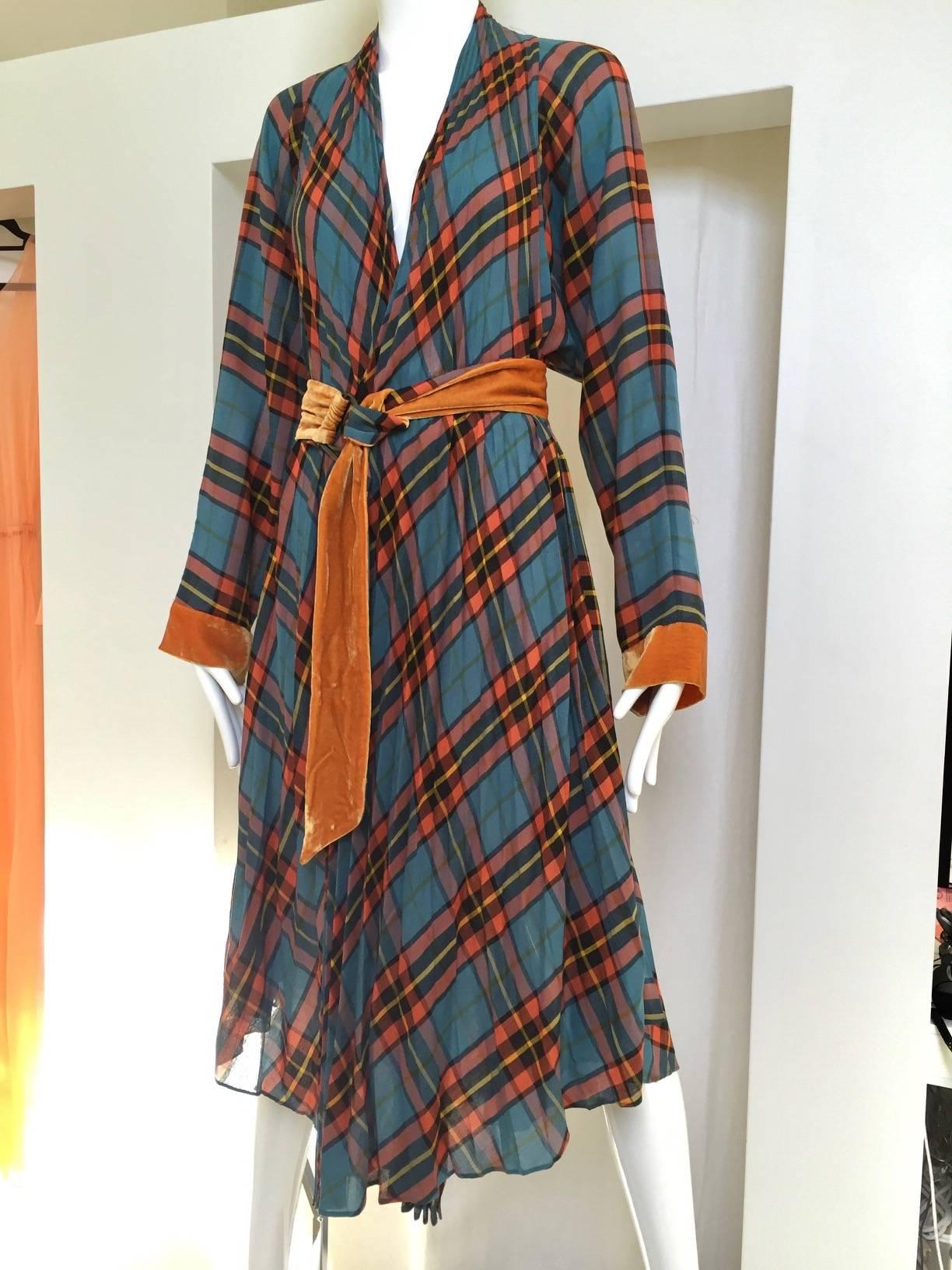 Jean Paul Gaultier light wool orange, teal and blak plaid wrap dress with velvet sleeve.  Fit size 4/6/8