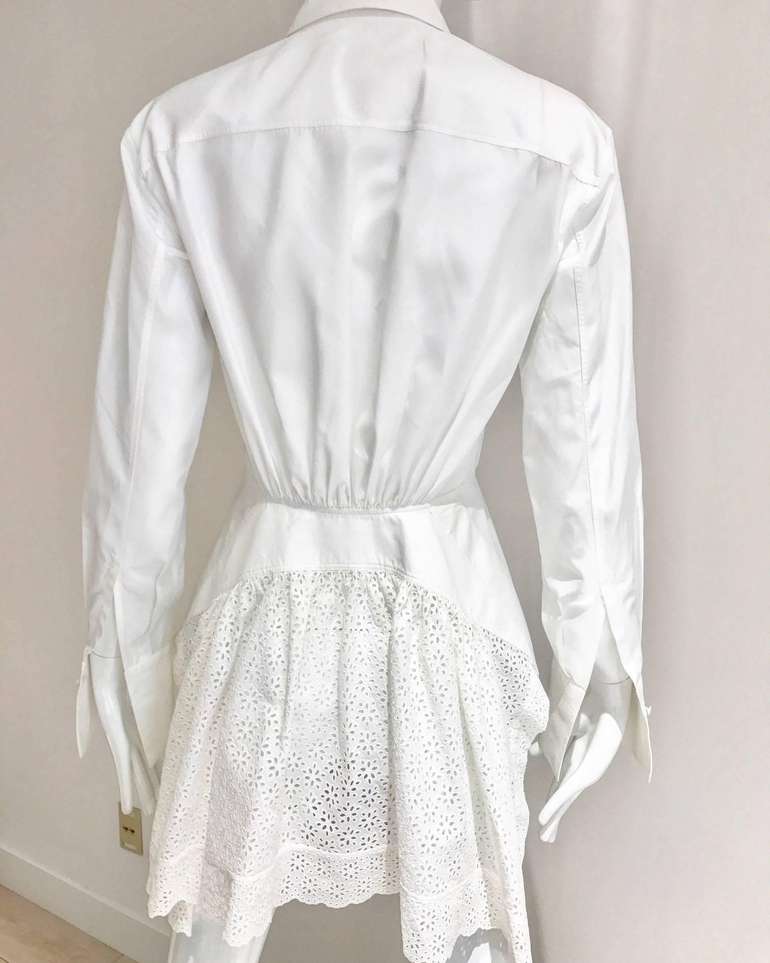 ALAIA white cotton shirt with eyelet tail.  Marked size 38
Fit US 4. Shirt in excellent condition.