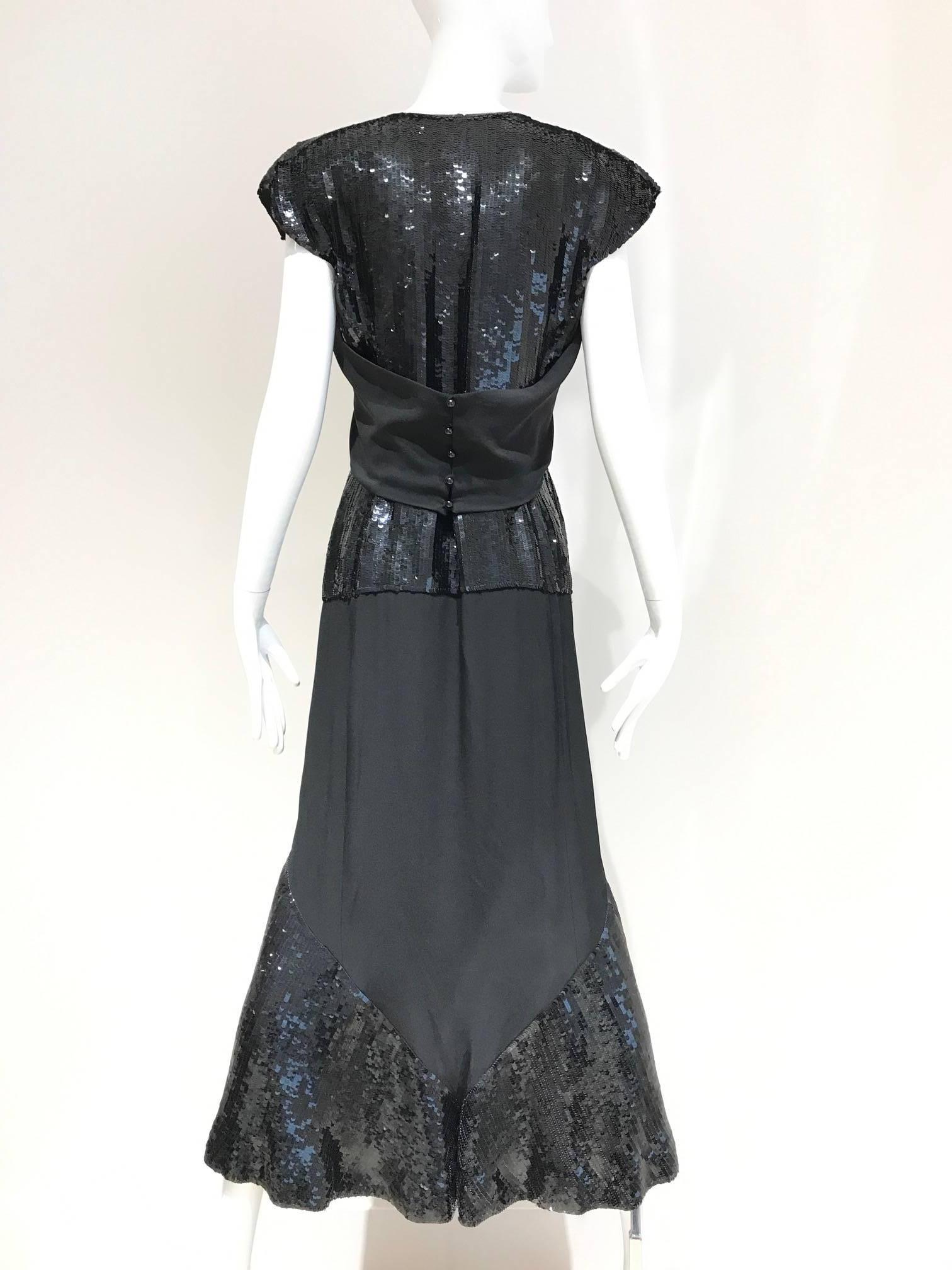 Vintage 1980s Chloe by Karl Lagerled black silk and sequin dress inspired by 1940s style. Cap sleeve with sequins.  Size 6.  Medium Made in france.  

36 inch Bust
30 Inch Waist
34 inch Hip / Dress Length: 51
