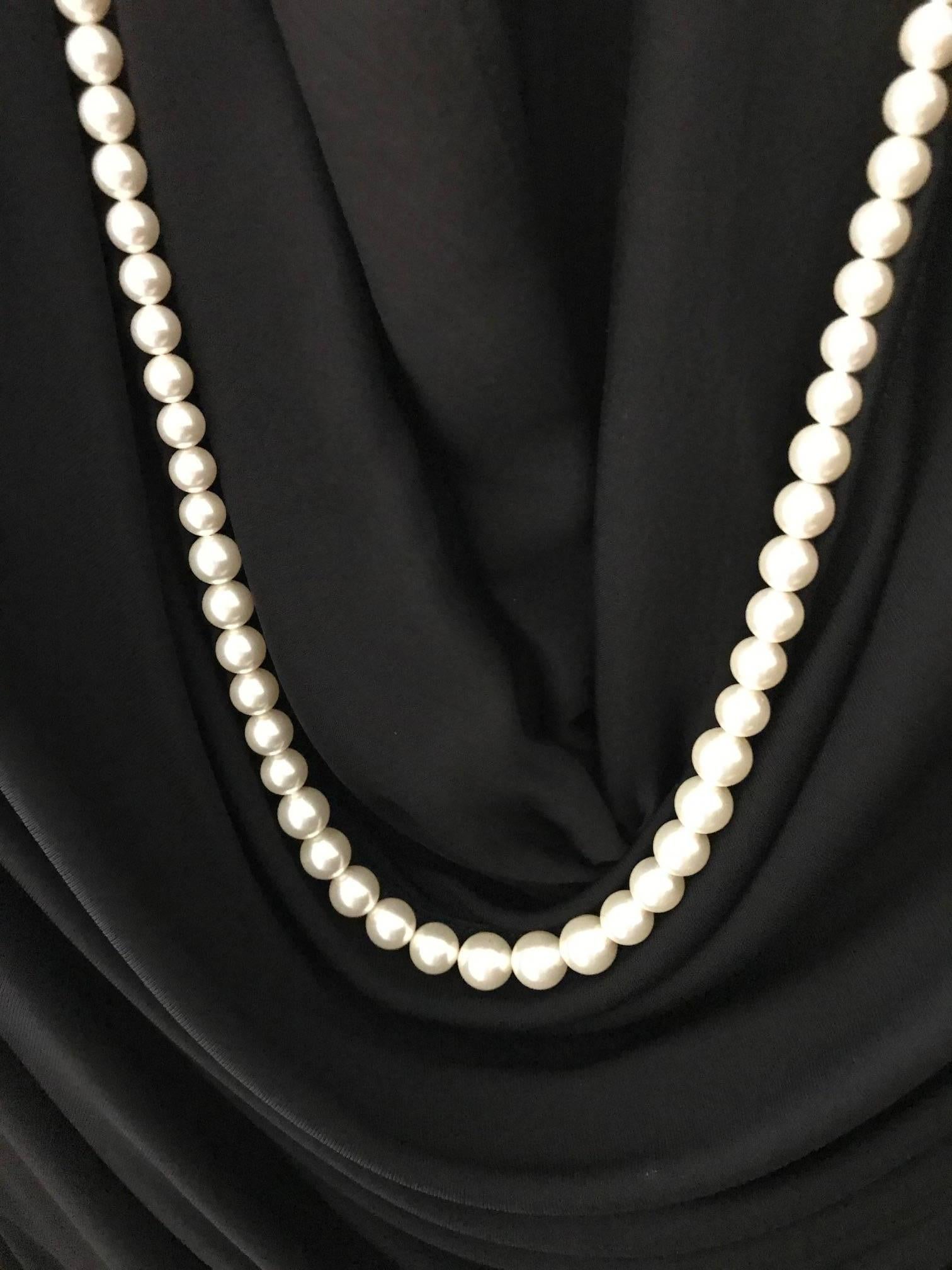 black dress with pearls
