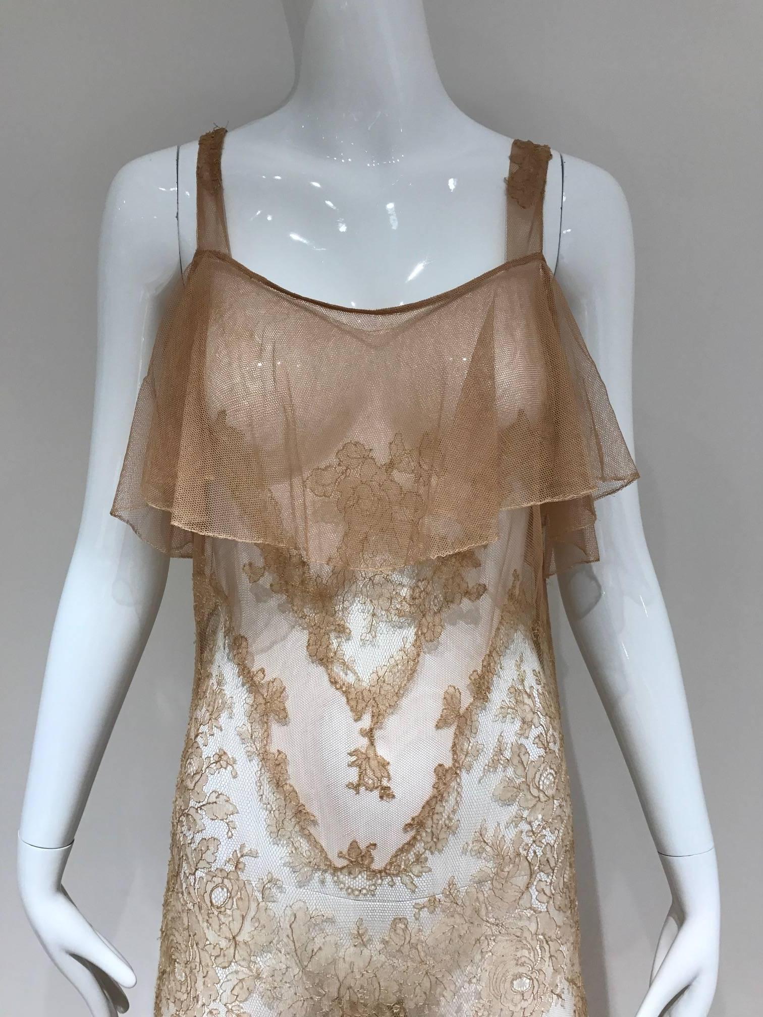 Fragile! For inspiration, design and study only.
Gorgeous 30s sheer lace tulle dress with silk embroidered applique.
Size: 4