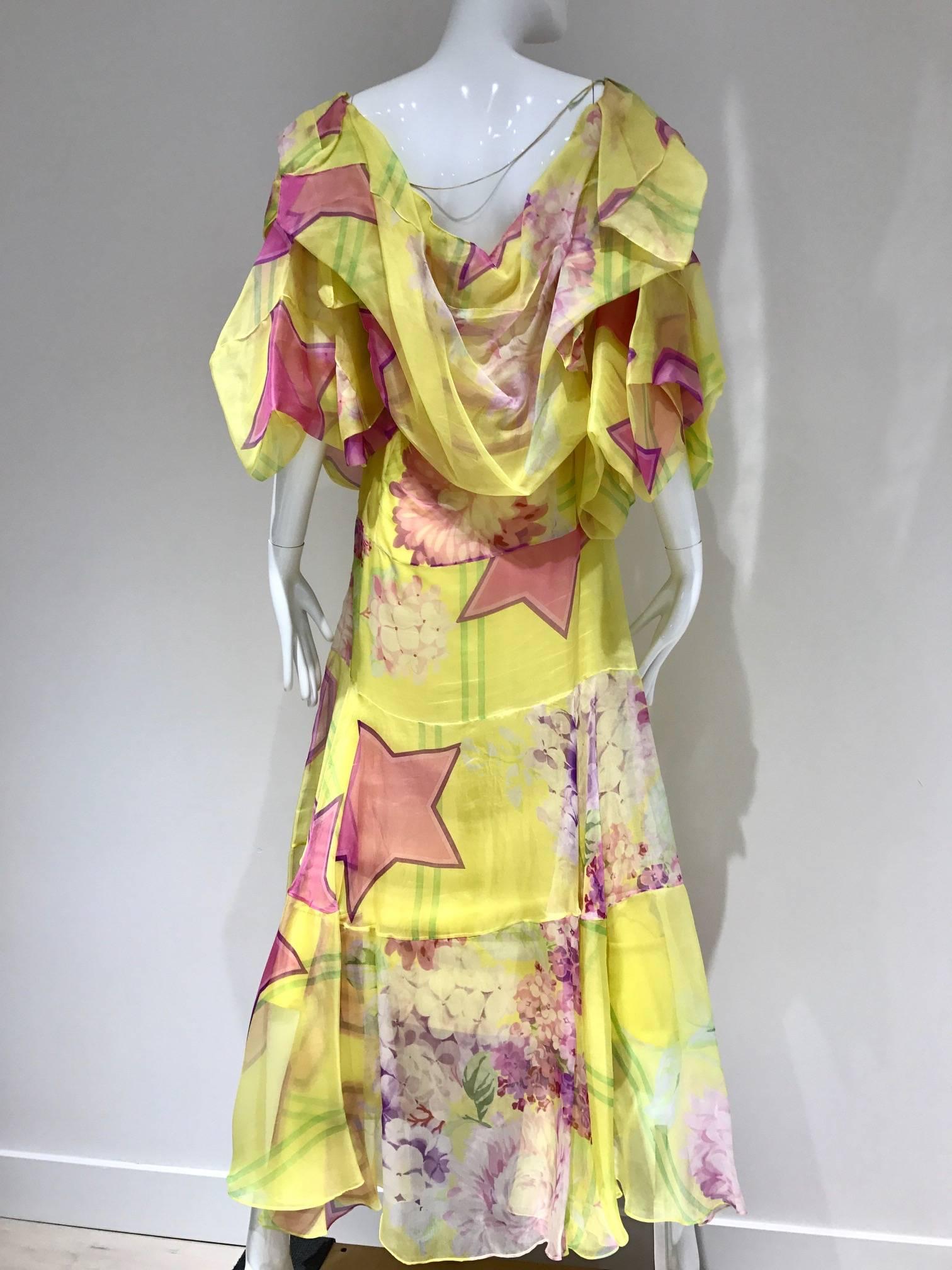 Christian Dior by john galliano yellow and pink silk print organza runway dress. Star and floral print trough out. Oversize off shoulder and dramatic sleeve.
Size 6 / Medium 
Bust: / Waist: / Hip: Length: 
*** This Garment has been professionally