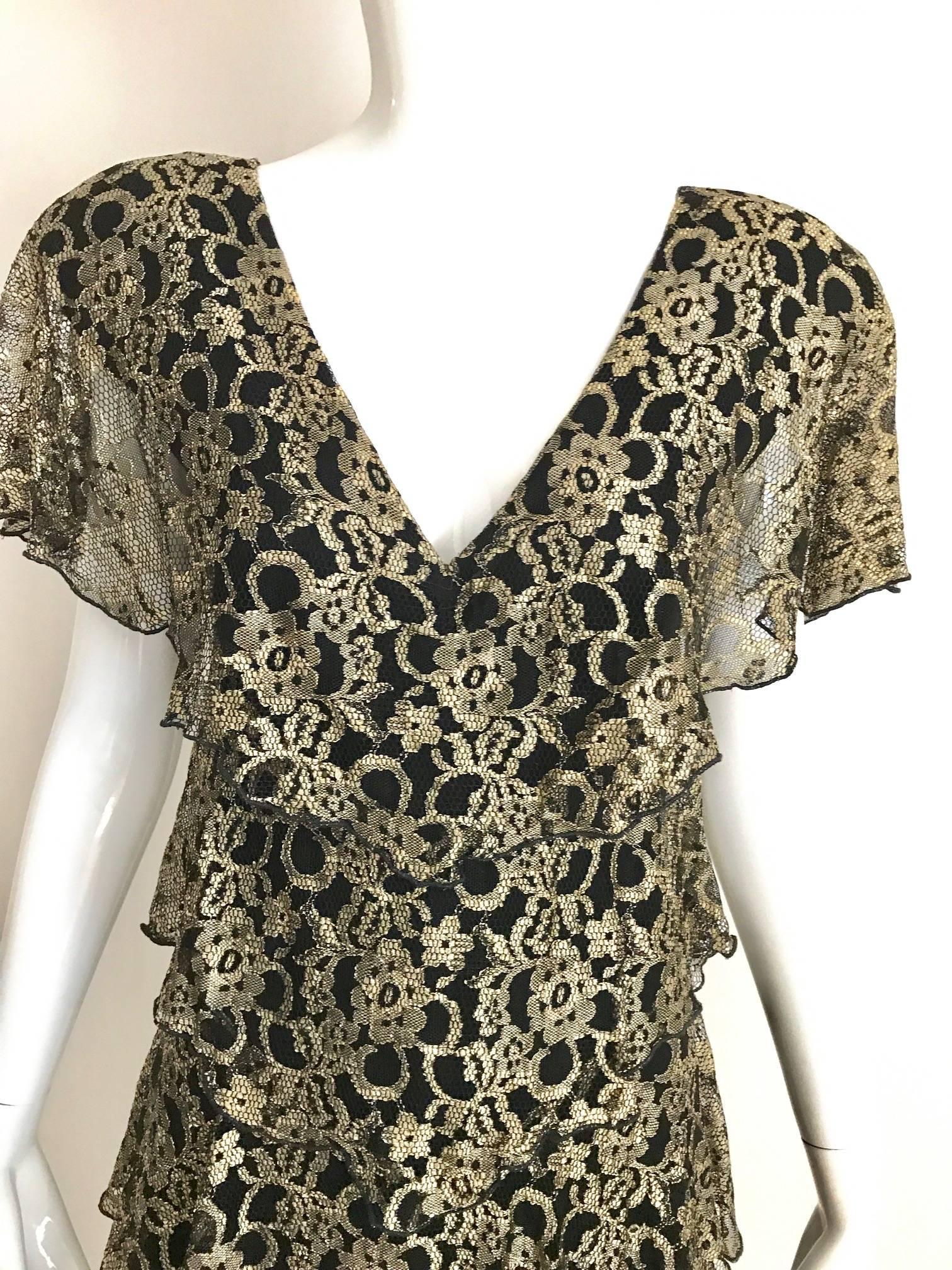 Vintage Holly Harp gold brown lace dress lined in black jersey.
Fit size US 4