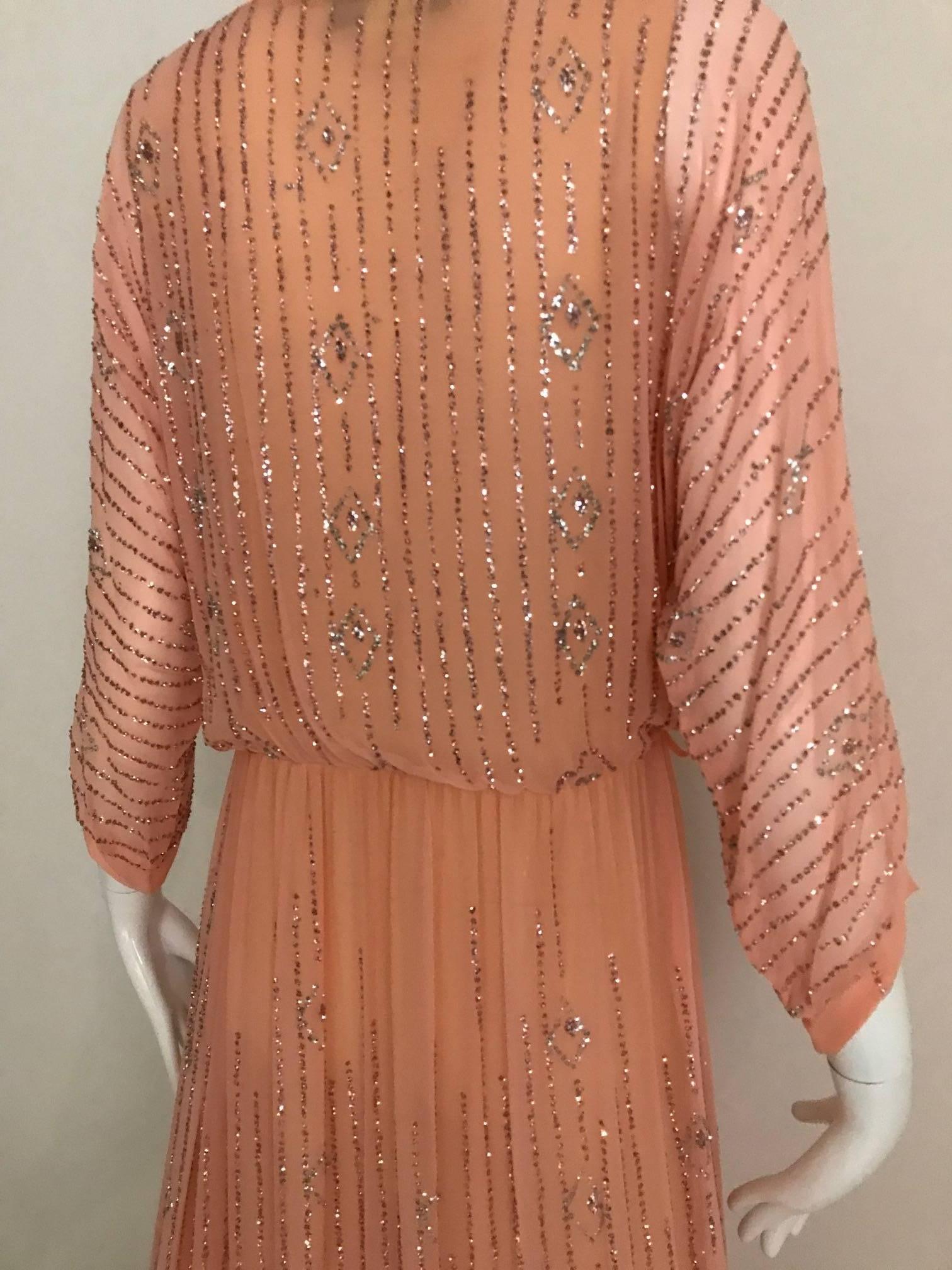 Women's 1970s Saks Fifth Ave peach dress with metallic glitter sequins maxi dress