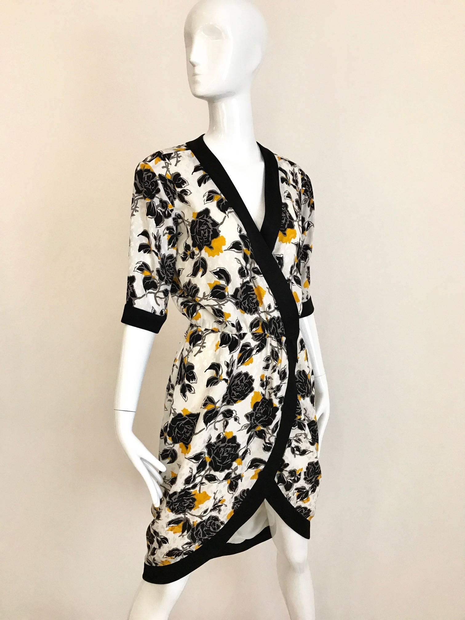 Vintage Saint Laurent Rive Gauche Black and Yellow Floral Print Wrap Dress In Excellent Condition For Sale In Beverly Hills, CA