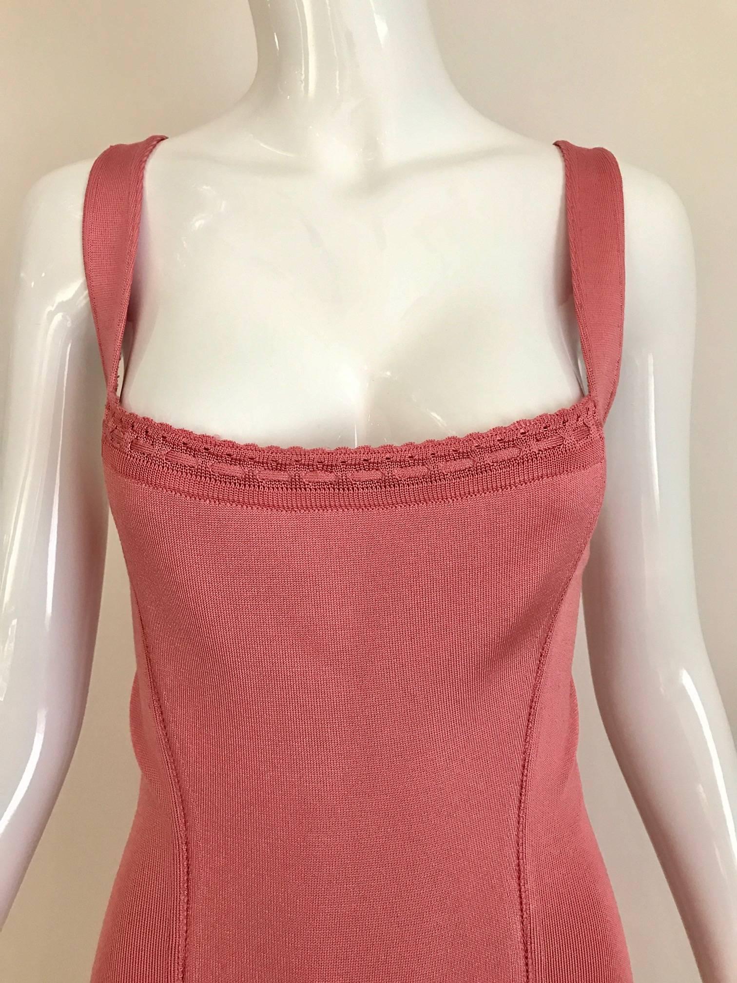 Vintage late 1980s and early 1990s ALAIA  sexy body con  racer back knit fitted dress in coral pink sorbet color. Classic ALAIA! Small- Medium
Measurement: ( some stretch)
Bust: 32 -  36 inch 
Waist: 24 - 30 inch
Hip: 30 - 36 inch / Dress length