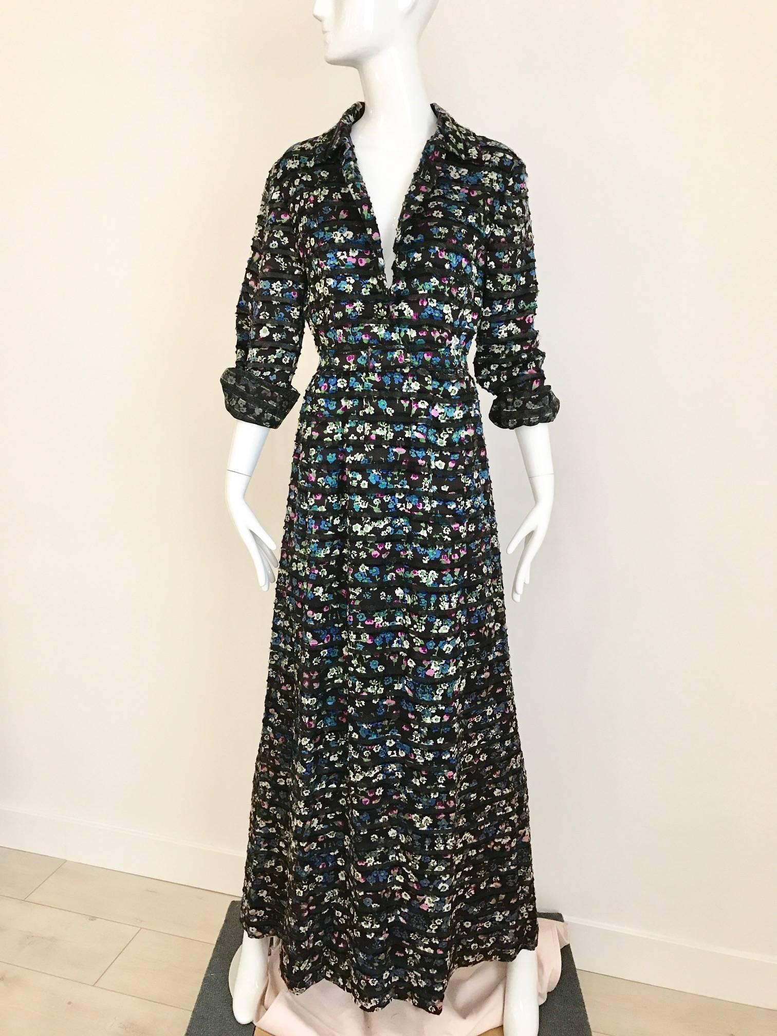 Vintage 1970s Givenchy nouvelle black silk shirtwaist maxi dress with pink, blue, white floral print. Dress has three covered buttons to closed down front to waist.  Zip up with  3 snaps and hook and eye to closed the waist. Dress is fully