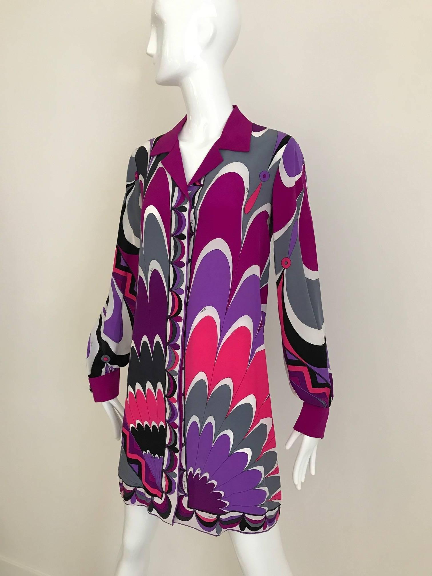 Vintage 1970s Emilio Pucci Silk Long Sleeve Mini Tunic Dress in Vibrant fuschia, purple , black and grey print. This Silk Tunic can be worn as Long Shirt or perfect for beach cover up!  This Tunic / Silk shirt in excellent condition. 
Fit Modern