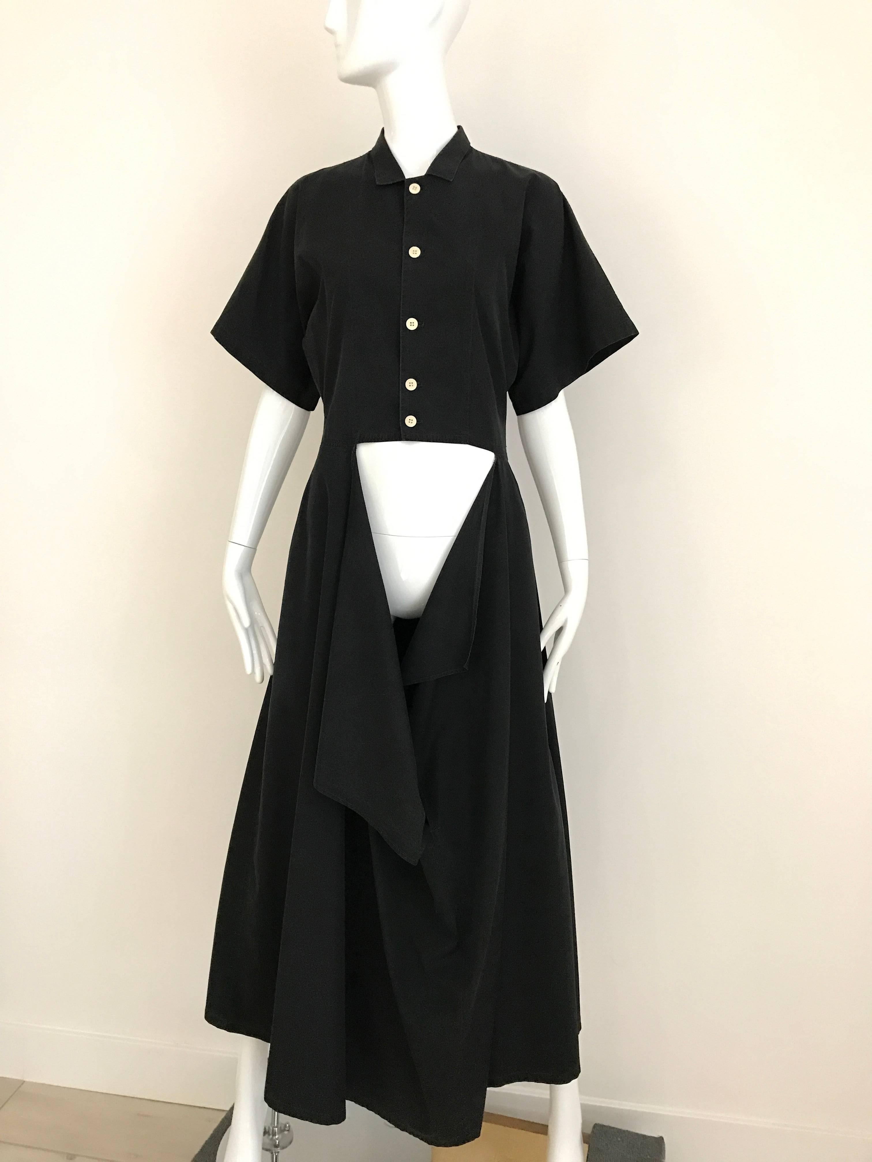 Vintage 1990s Yohji Yamamoto Black Cotton Dress with Cut out wrap skirt.
Size: Medium
Bust: 36 inch/ Waist: 28 inch/ Hip: 40/ Length: 52
**** This Garment has been professionally Dry Cleaned and Ready to wear.