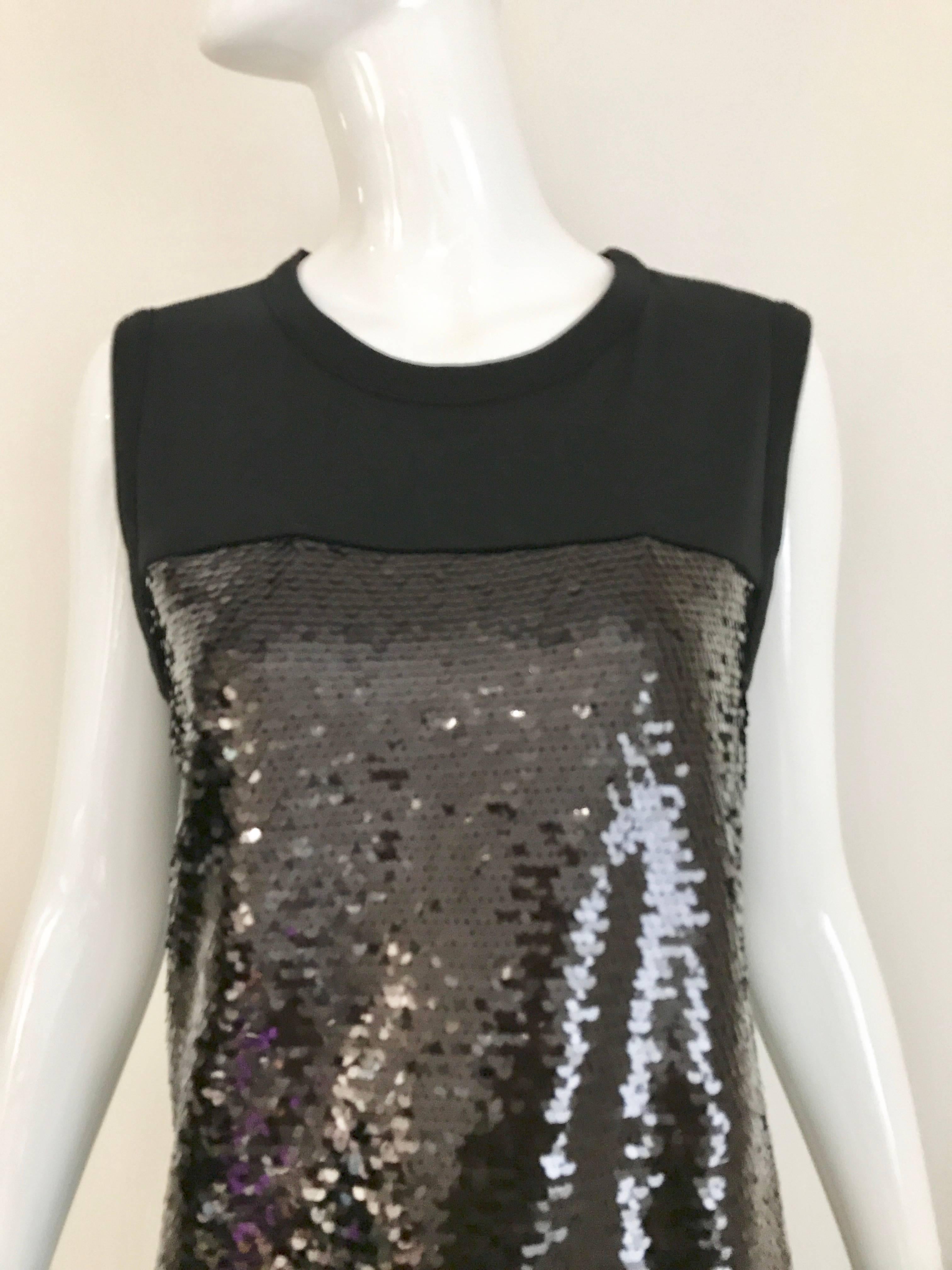 Chic Giambattista Valli Black  Sequin Sleeveless soft Knit Dress.
Fit size 6/8
Bust: 38 inch/  Hip: 40