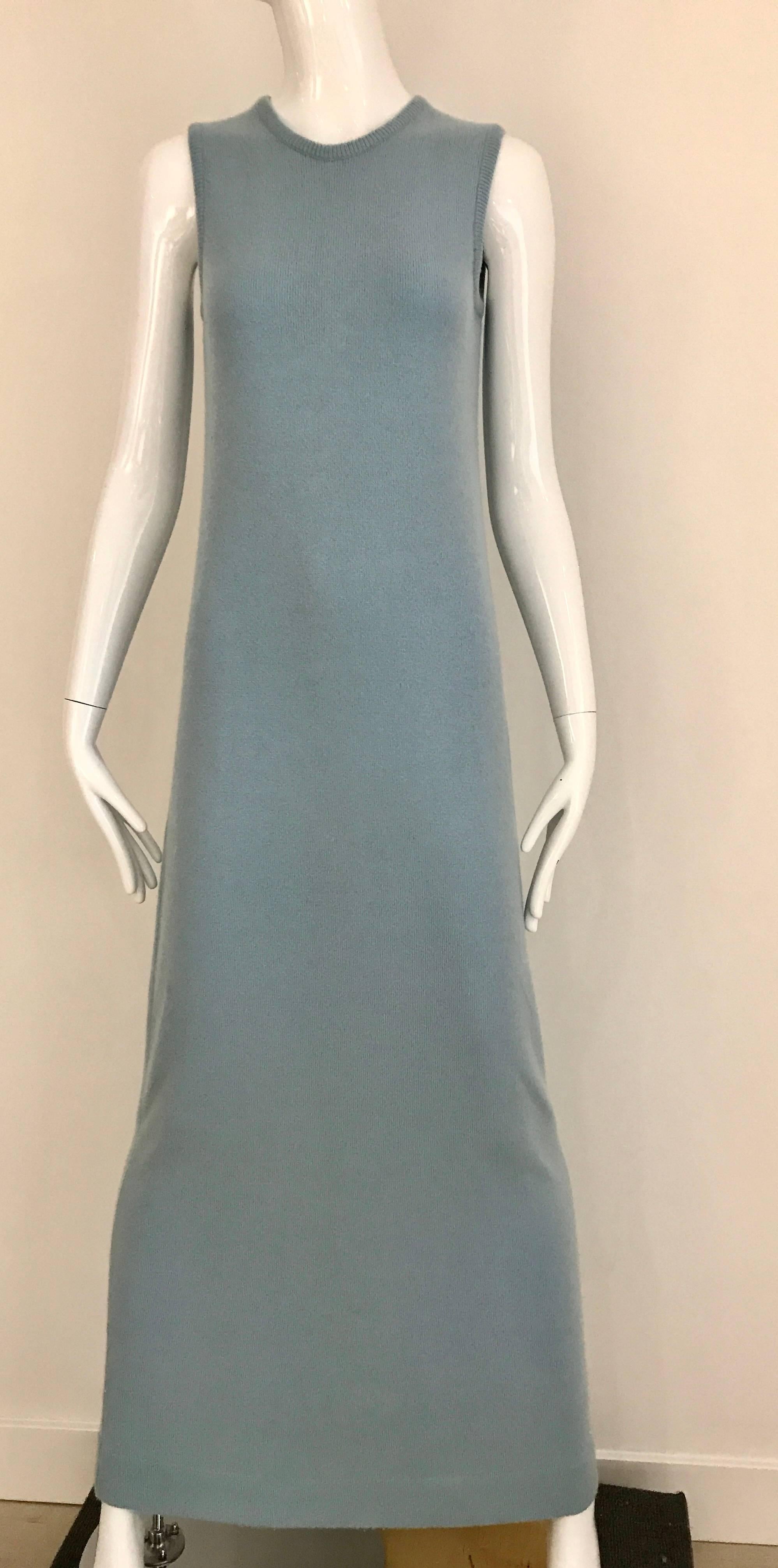 1970s HALSTON Baby Blue Sleeveless Cashmere Sweater 70s maxi Dress. 
Fit Size 2/4/6
Bust: 32 - 36 inch
Waist: 32- 36 inch
Hip : 36 - 38 inch  / Dress Length:  55 inch
**** This Garment has been professionally Dry Cleaned and Ready to wear.
Small