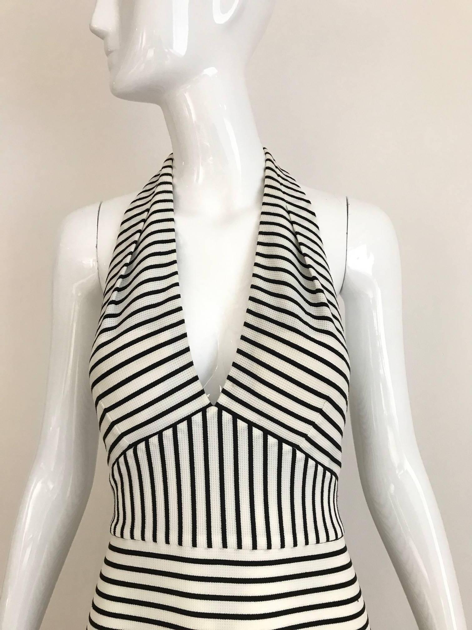  1990s Black and White Knit Stripe Nautical Halter body con maxi dress.
Perfect vacation dress.
Fit 4/6 
Bust: 34 inch/ Waist: 26 inch stretch 32 inch / Hip: 34 inch stretch to 38 inch/
 Length: 54 inch
