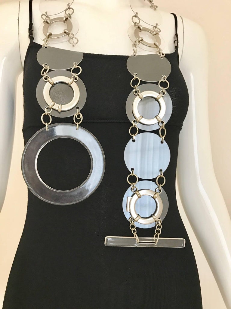 Rare Vintage Paco Rabanne Clear Lucite Disc Belt or Necklace. 
Worn as a belt is very Large belt. 
Belt is 38 inches long / Disk width : 2 1/4”
Buckle is 3 7/8 diameter 
In excellent condition.