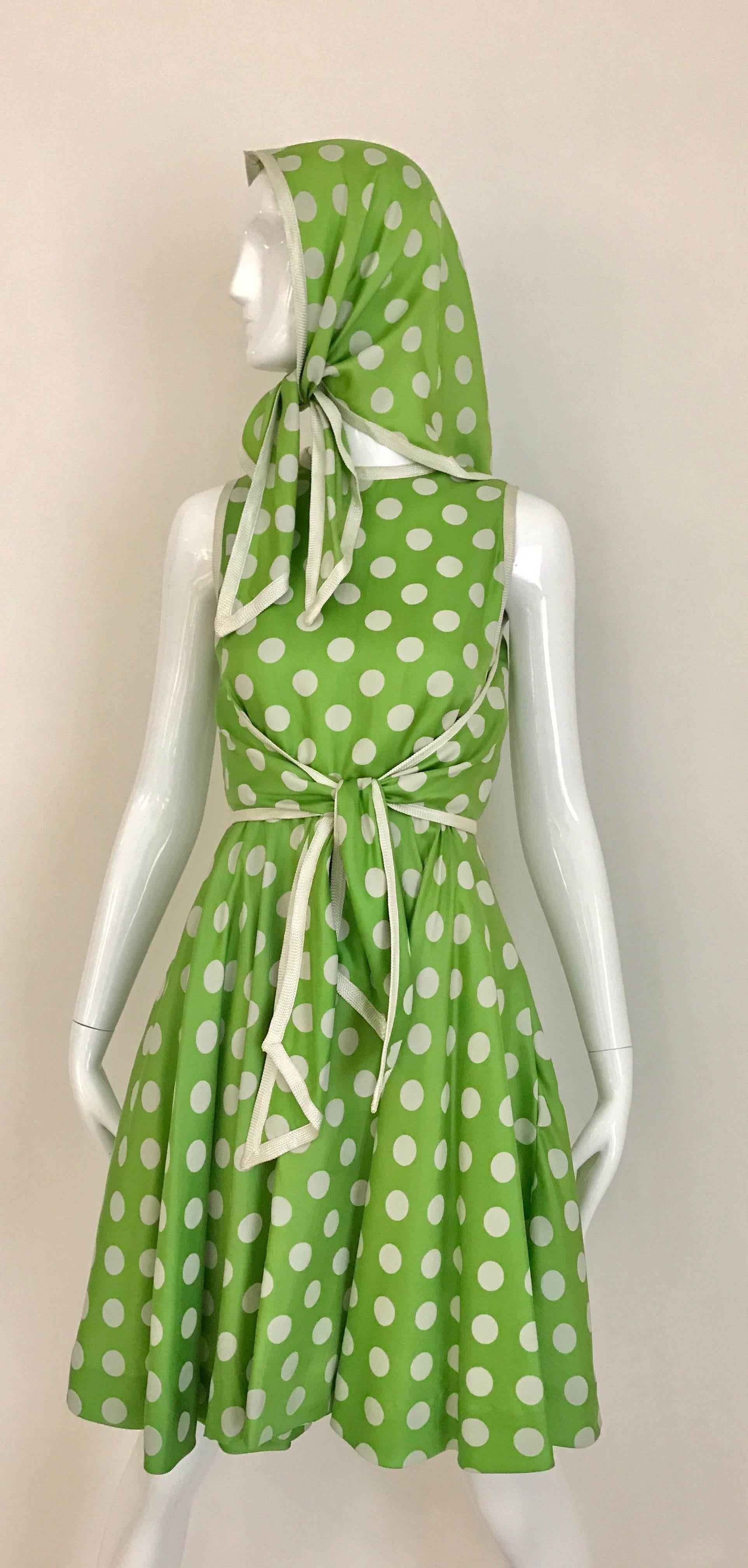 Vintage Early 1960s Teal Traina lime green and white polka dot sleeveless silk dress with scarf/shawl. Dress has belt that attached to wrap in the front. Zip at the back.  Perfect dress for summer cocktail party . Scarf can be also worn as a