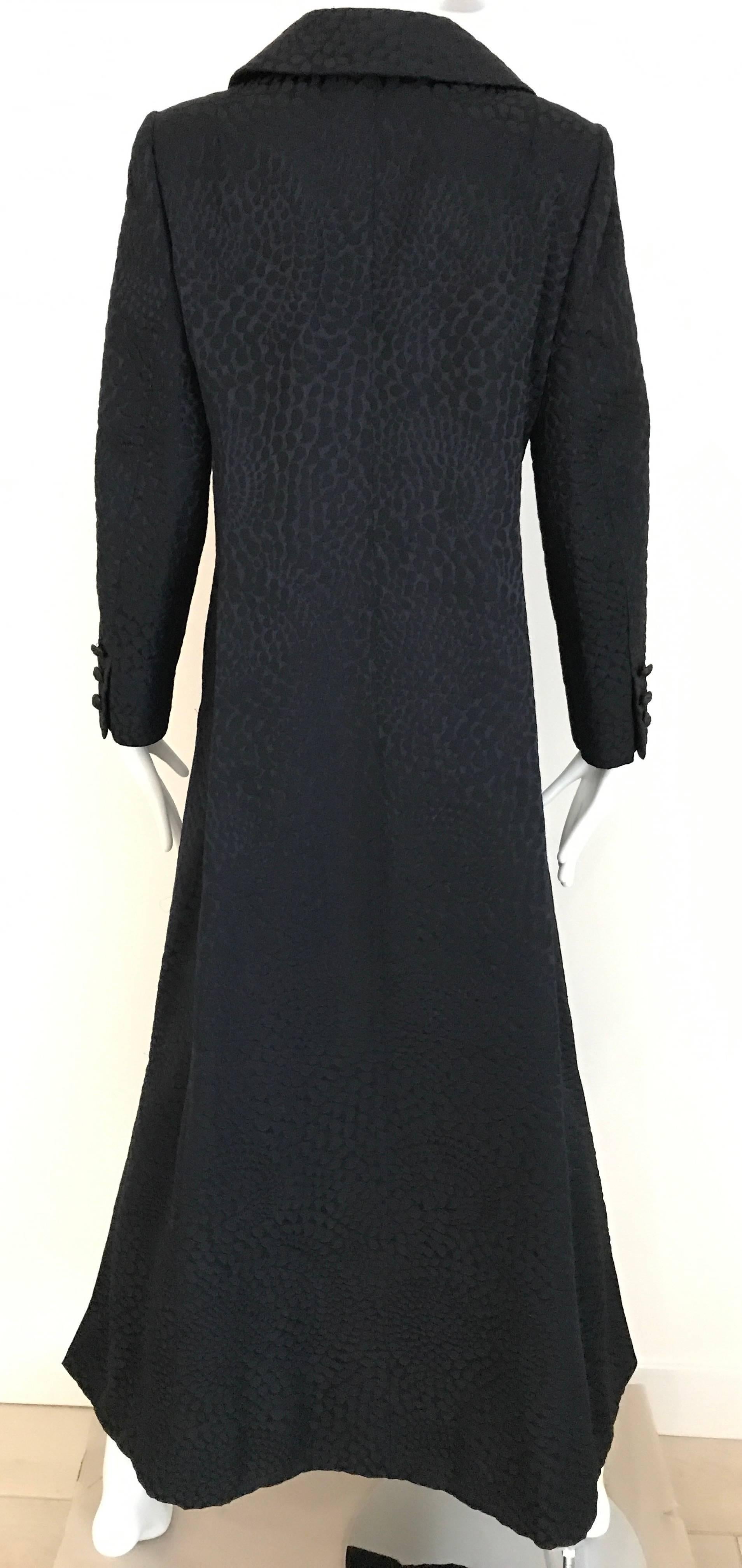 1960s  Black Cotton Jacquard evening  long coat/ Jacket with 2 front pockets.. This coat is in excellent condition and is barely worn. coat is  lined beautifully in silk jacquard. Fitted slimming look. Label: Eres Couture 
Size Small - Medium ( 4 /