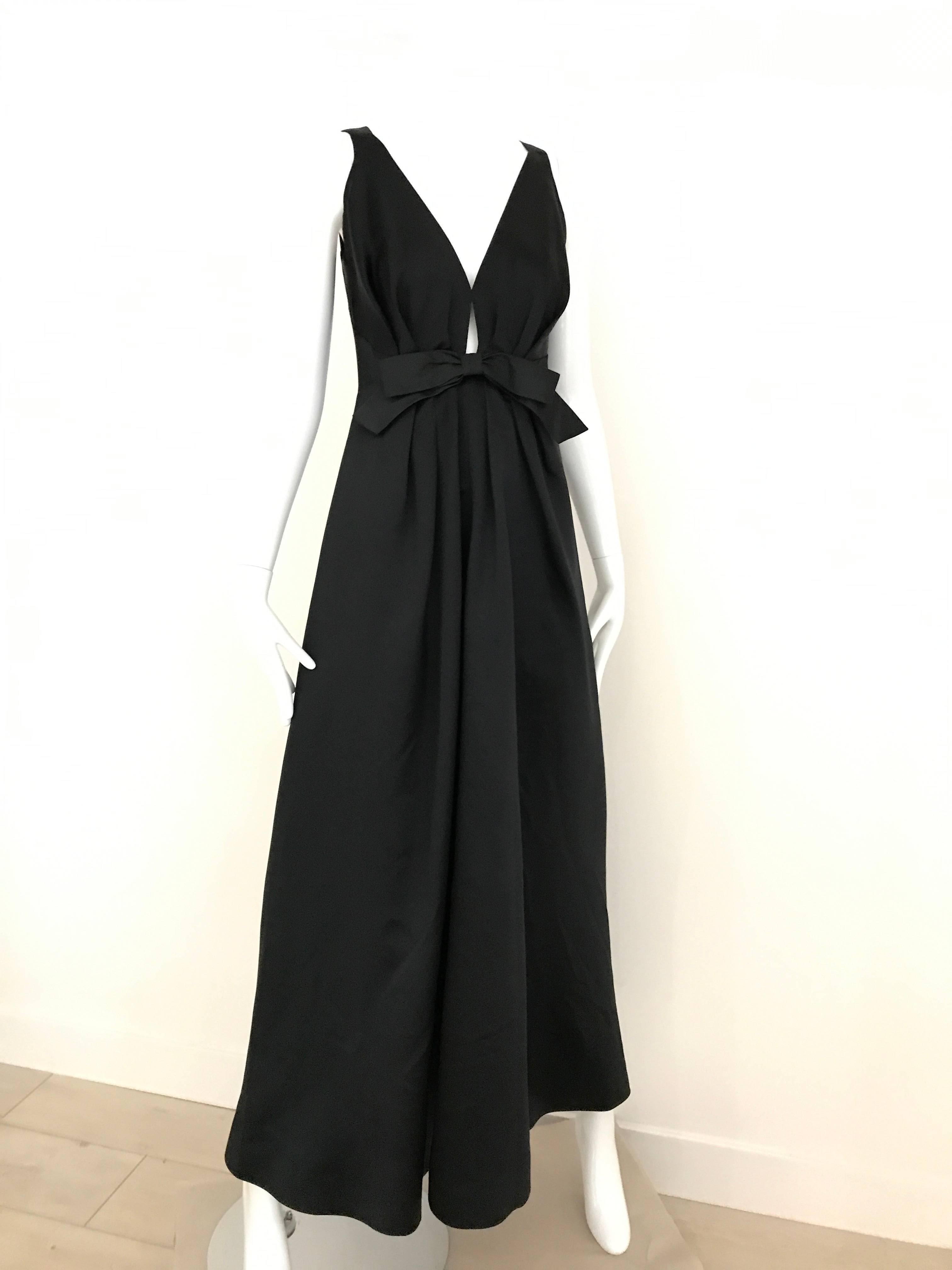 Women's Elegant 1960s Adelle Ross Black Silk V neck Gown with bow