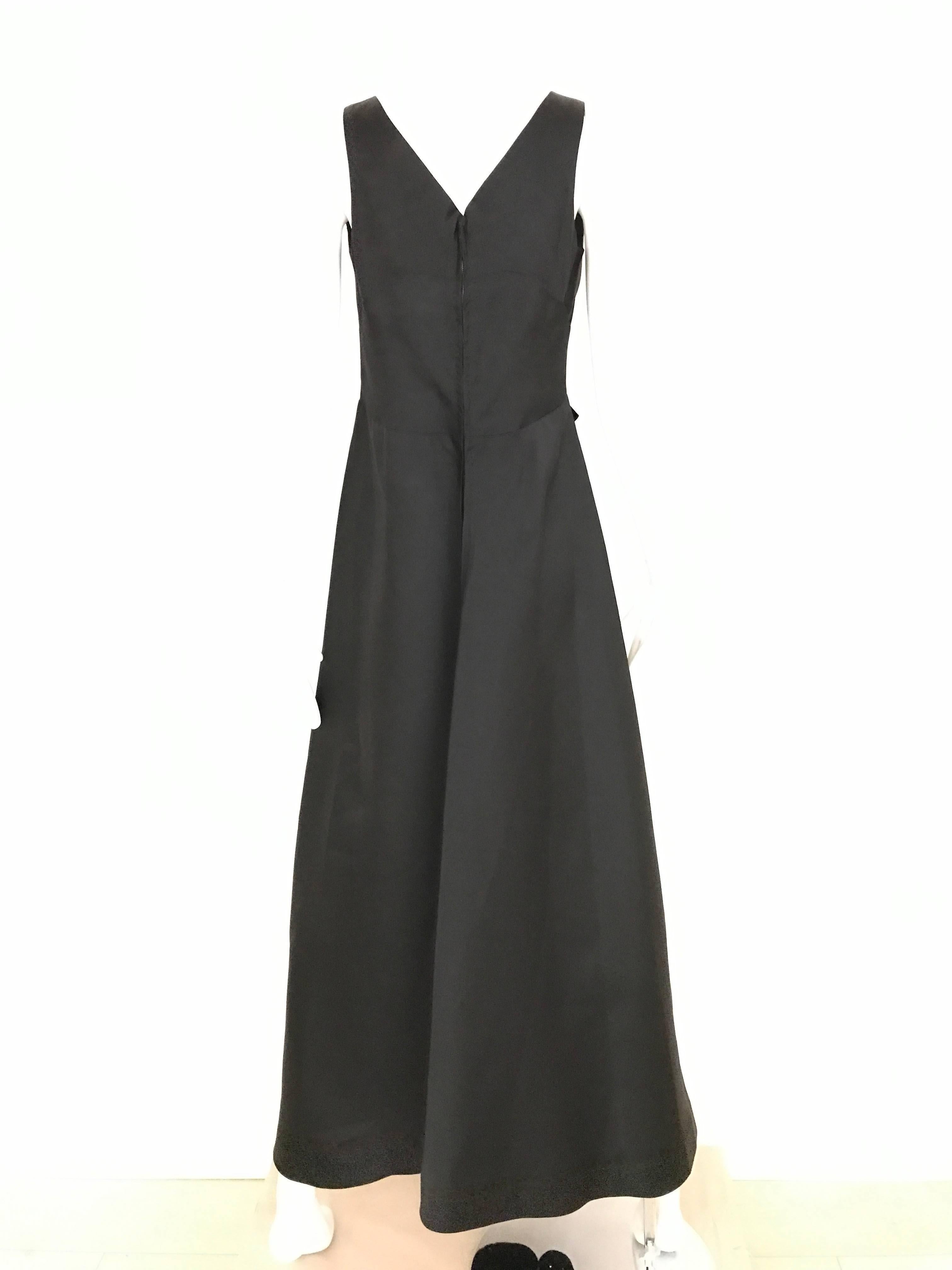 Elegant 1960s Adelle Ross Black Silk V neck Gown with bow 1