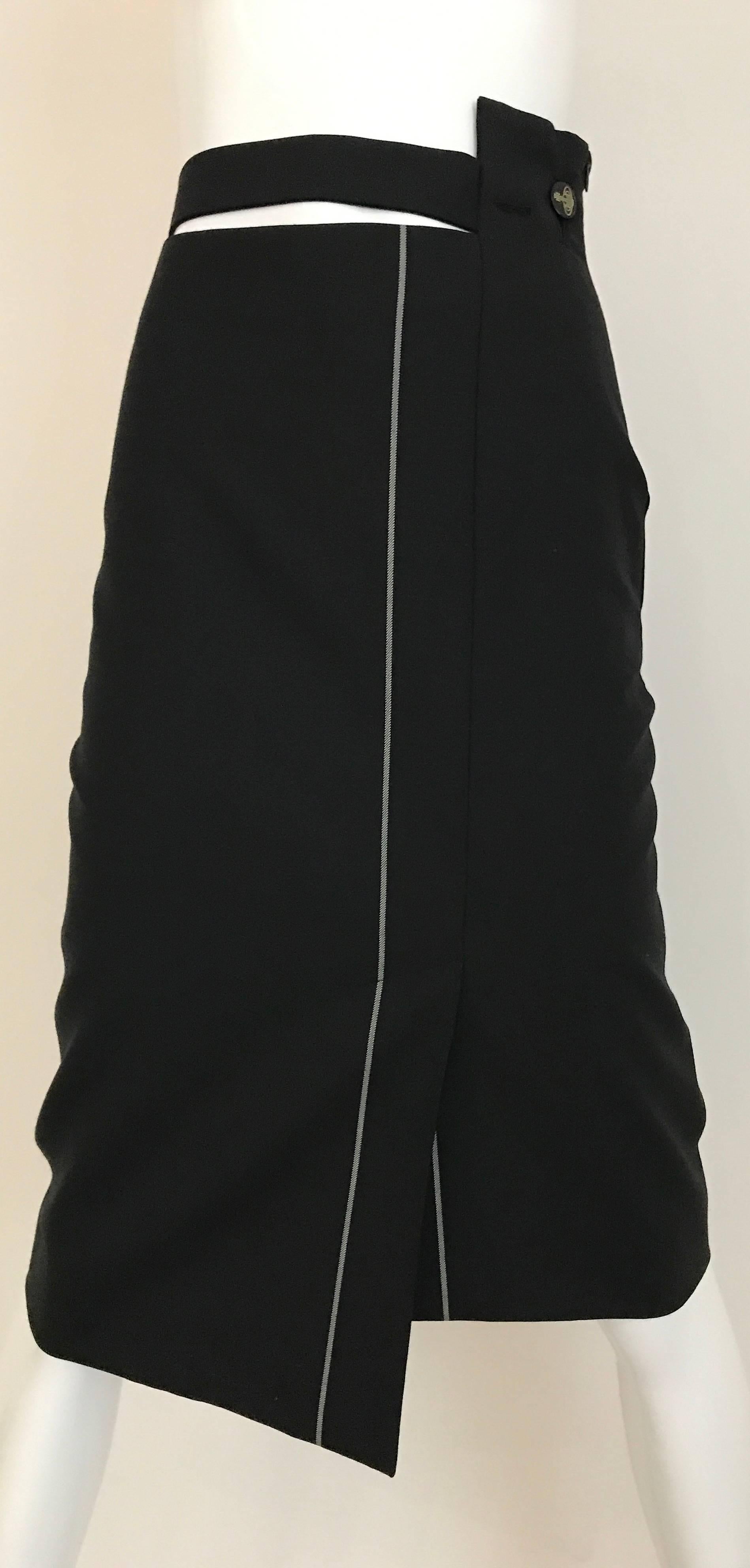 Vintage Viviene Westwood Black Wook with Grey Pin striped asymmetrical Skirt.
Waist 27 inch / Hip 36 inch