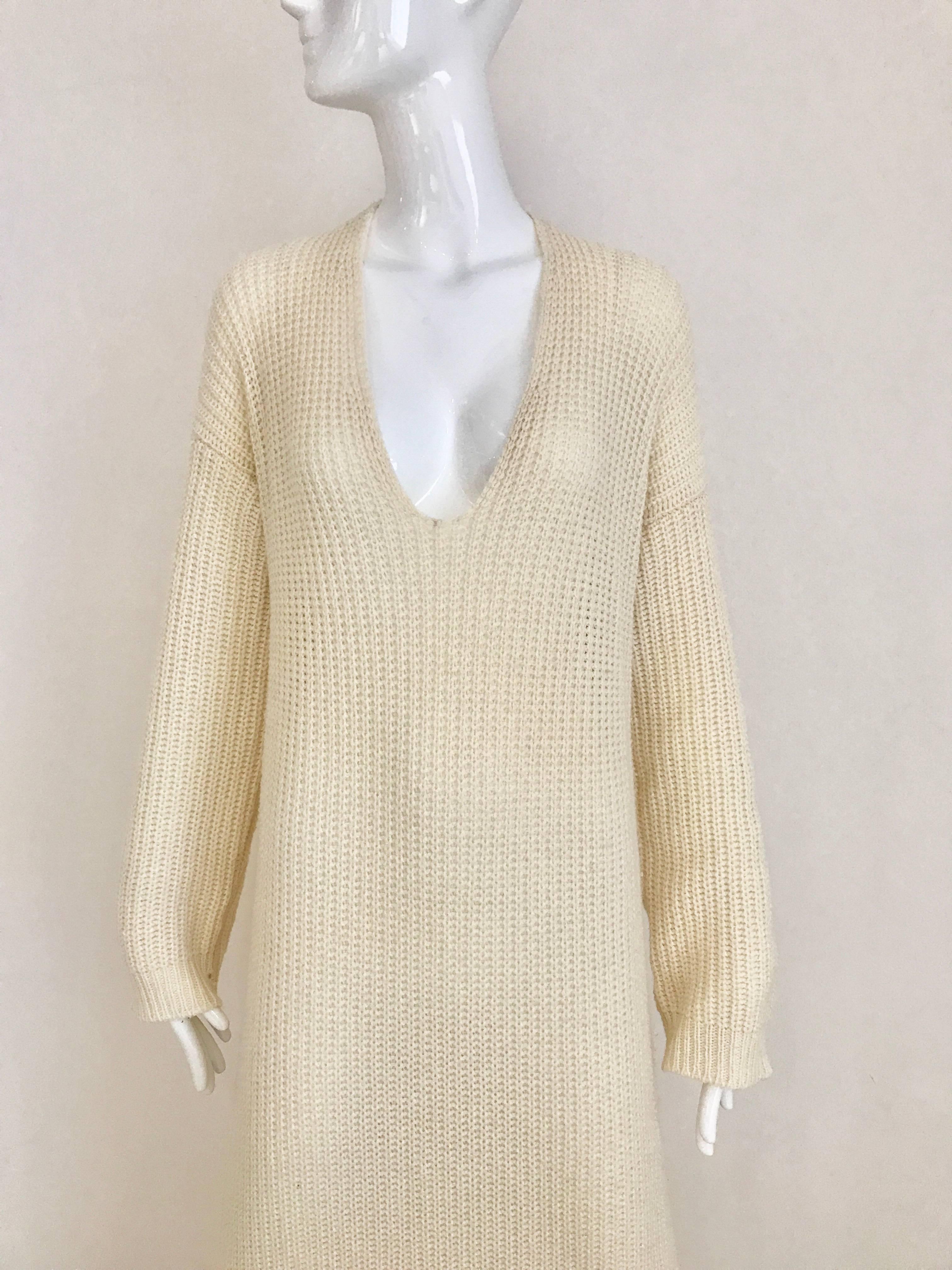 Cozy and Chic vintage Jil Sander Creme Ribbed Cashmere Long sleeve sweater dress. 
Size: Medium and Large.  Fit size 6/8/10
Bust: 40 inch/ Waist: 40 inch / hip 40 inch / Dress Length: 62 inch
V neck depth: 10 inch / sleeve length:  20 inch

****