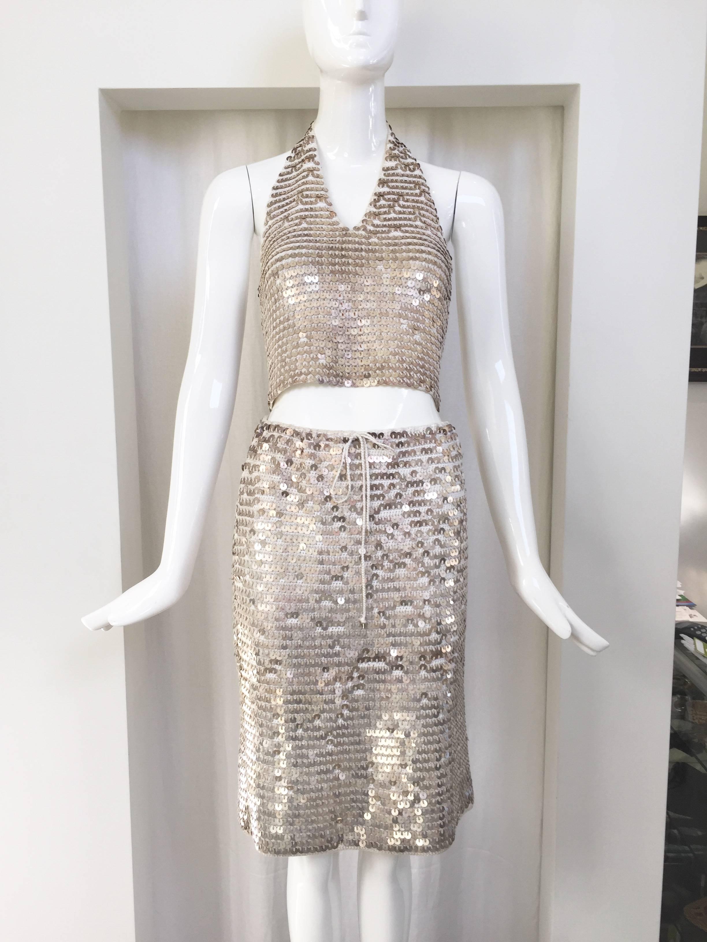 From Spring 2000 runway collection (see image) 
Halter cotton top  and skirt set with metal sequin.

Size : 38. Fit size 2,4  US size.

Drawstring skirt.