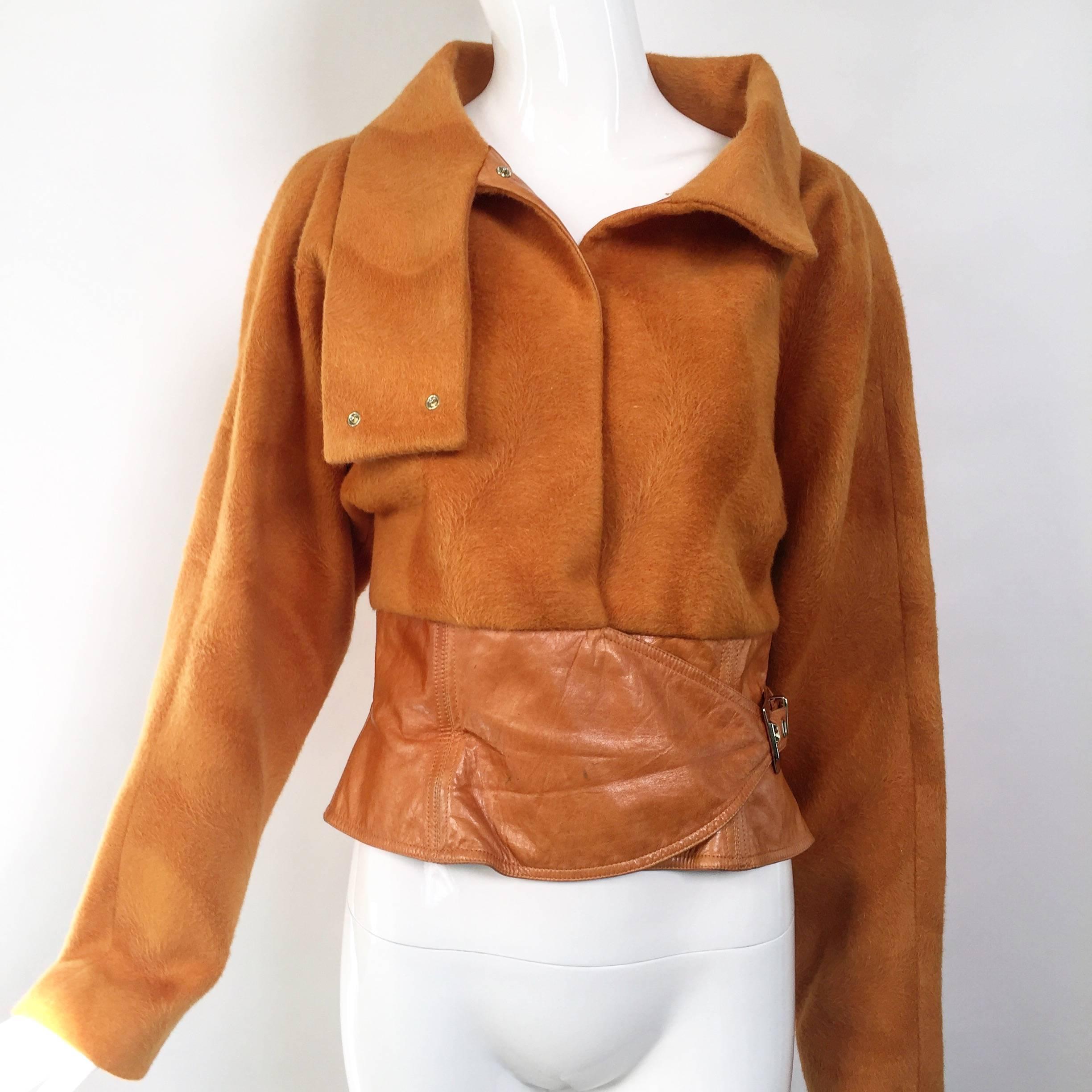 Gianni Versace soft cashmere-leather jacket. Beautiful color.
Marked size 44 but fit size 4-6-8
Bust : 36
Waist : 30.5, the smallest hole on the belt is 26