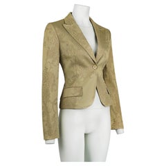 Blazer entallado de Alexander McQueen con estampado jacquard floral dorado IT44