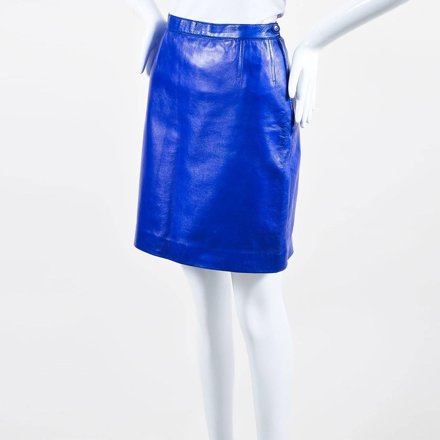 Bold pencil skirt that can transition from day to night. Supple leather construction. Hits above knees. Side button closure. Hidden side zip closure. Lined.

