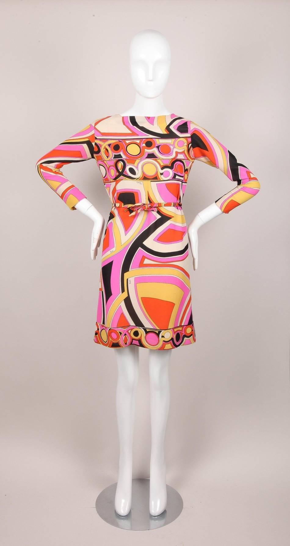 This Vintage Emilio Pucci dress was gifted from Pucci himself.
This signature abstract pattterned lightweight fine silk dress features an
angled boat neckline, 3/4 length sleeves and a shift silhouette. Narrow bow detail belt. Lined

Additional