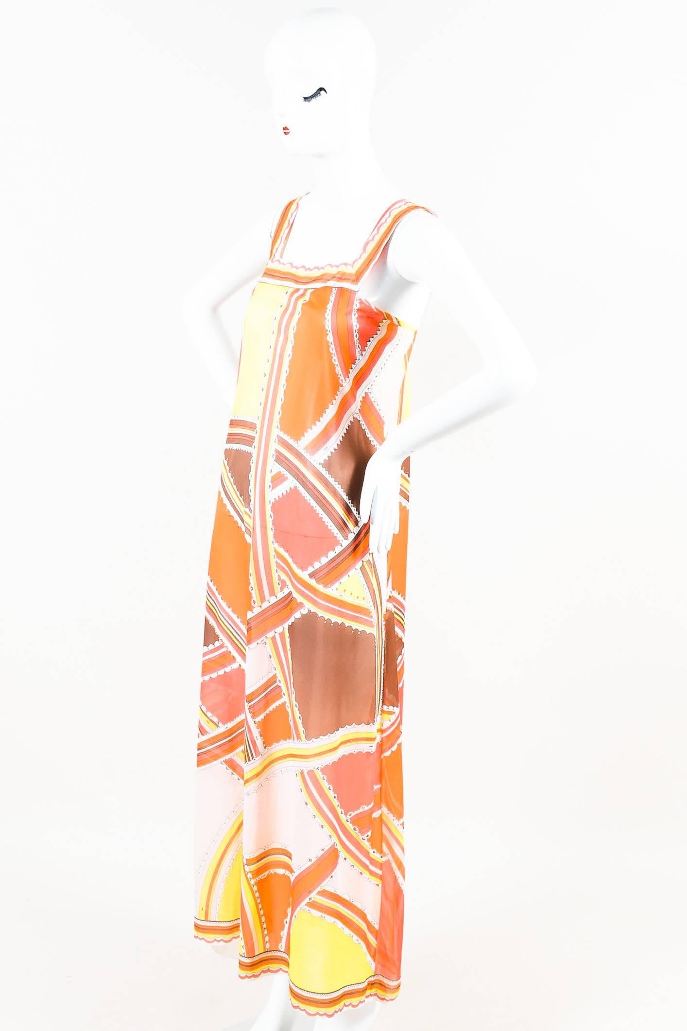 Lightweight, sheer jersey flowy maxi dress with multicolor abstract print. Sleeveless. Square neckline. Hits at feet. Pulls on. Unlined.

Additional Measurements:
Shoulder -to- Shoulder: 10.625"