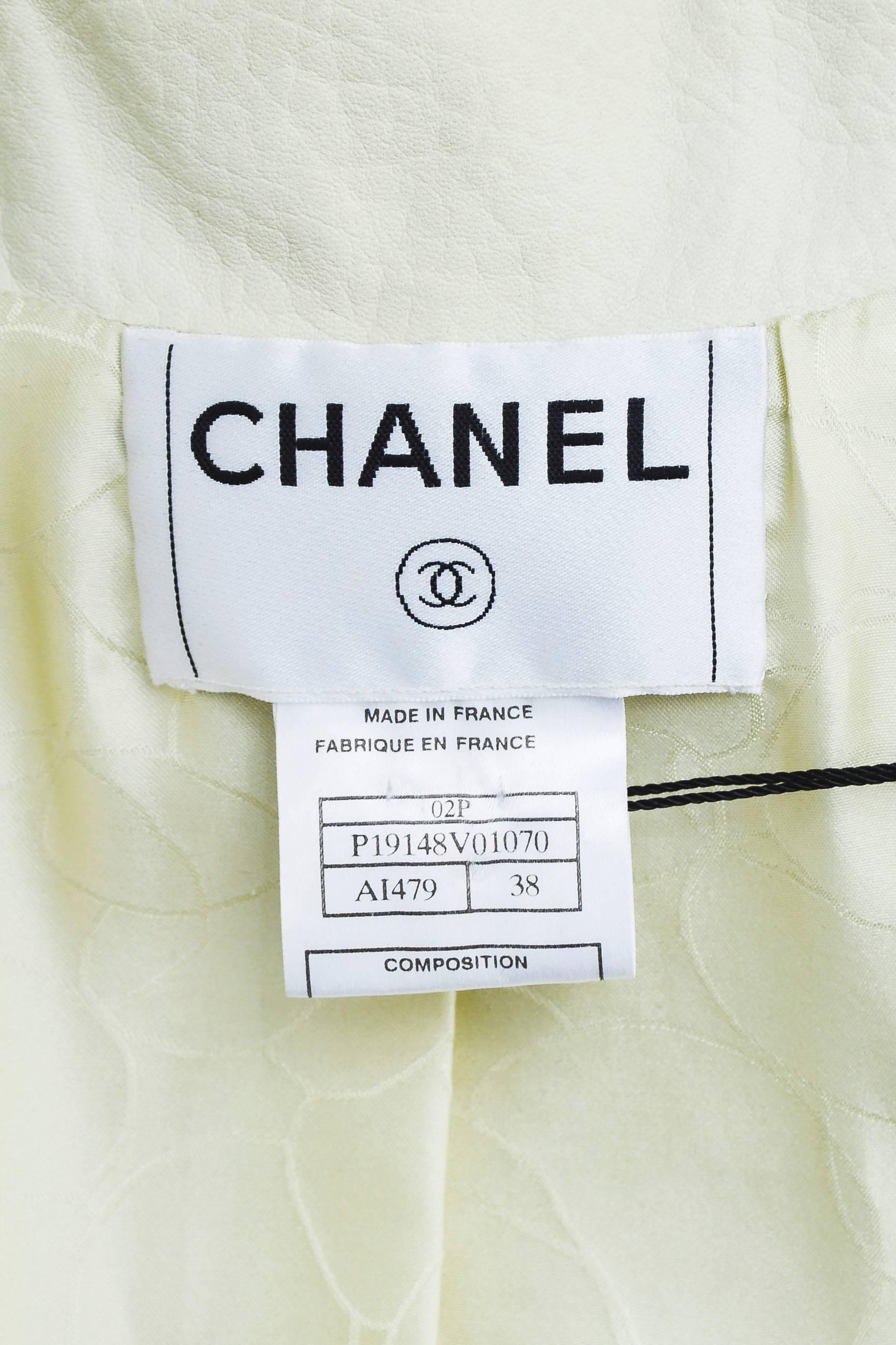 Women's ﻿Chanel 02P Cream Pebbled Leather Silver Tone 