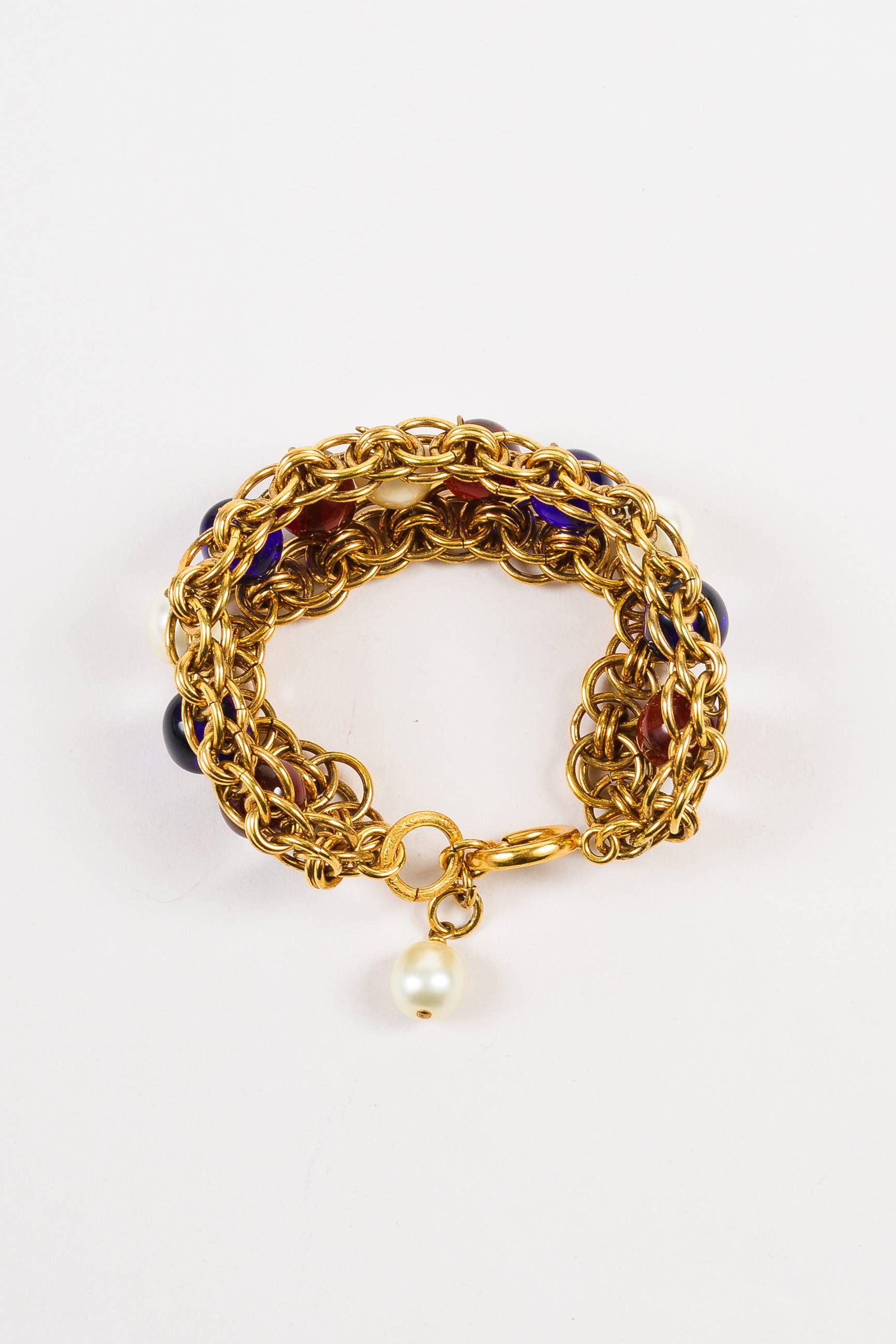 Vintage Chanel Gold Tone Blue Red Faux Pearl Beaded Layered Chain Link Bracelet In Fair Condition For Sale In Chicago, IL