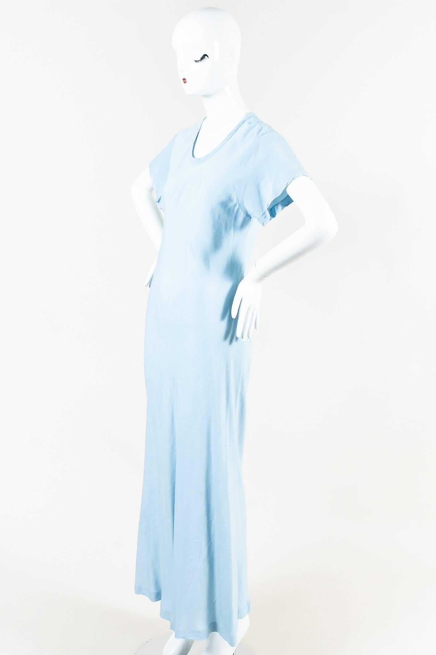 Baby blue maxi dress. Scoop neckline. Short sleeves. Pull-over style. Unlined.

Additional measurements: Sleeve Length 7", Shoulder -to- Shoulder 16"