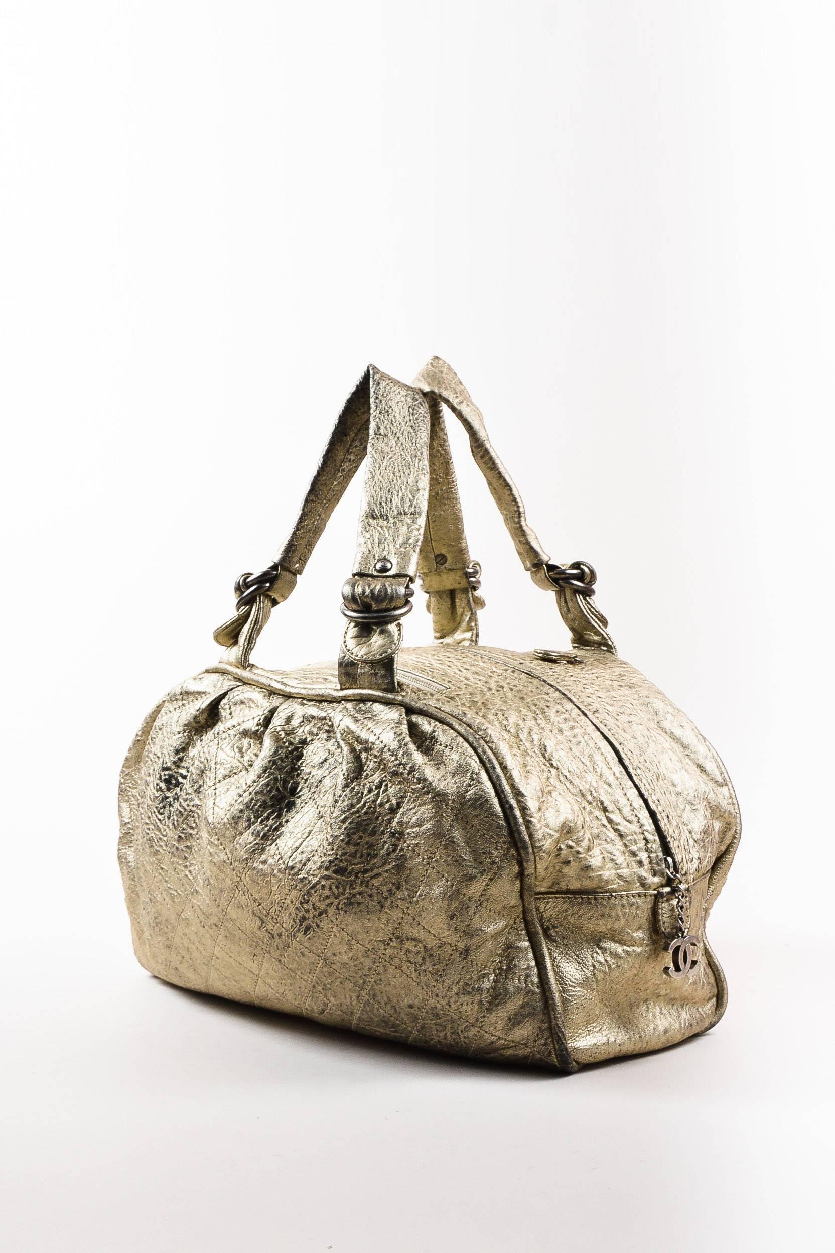 Retails at $2,350. Distressed black leather 