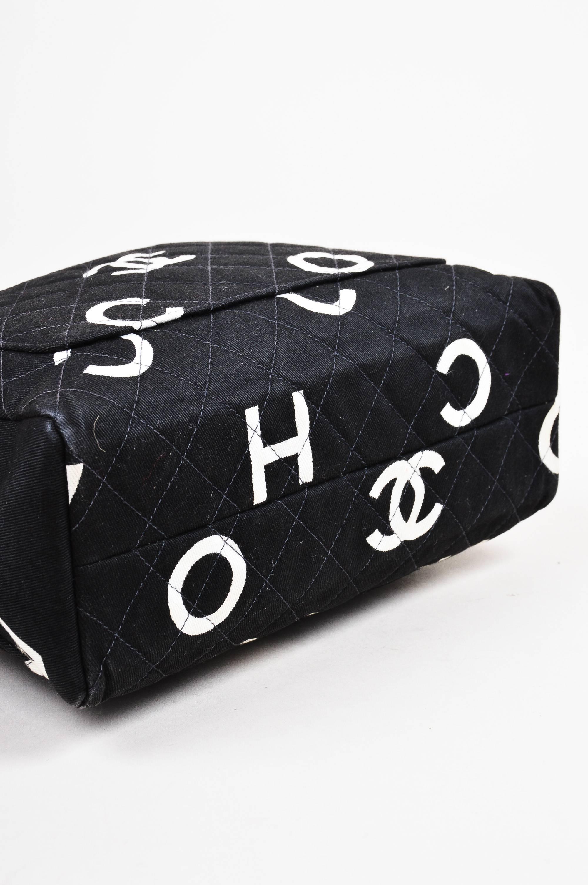 Vintage Chanel Black White Canvas Printed Letter Quilted Double Handle Bag In Good Condition For Sale In Chicago, IL