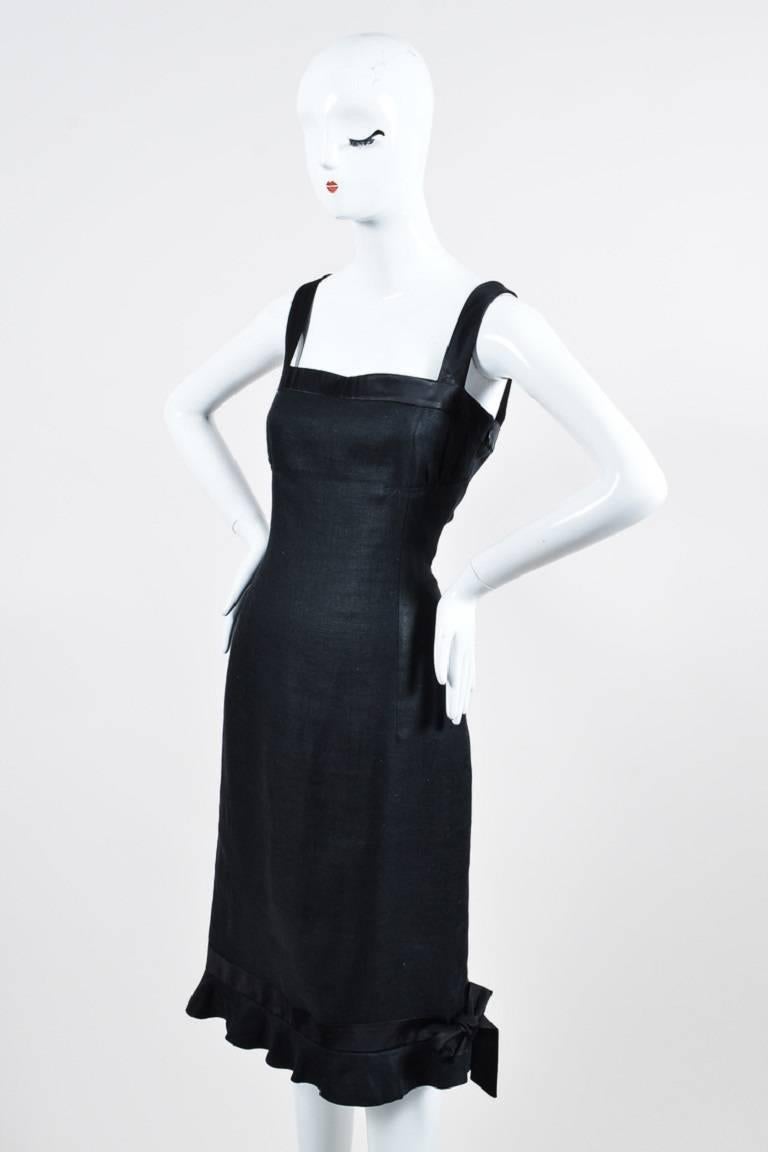 Color: Black
Made In: Italy
Fabric Content: Flax Linen

Item Specifics & Details: This vintage piece is simple and constructed of a lightweight and eco-friendly flax. Features a square neckline, wide straps, feminine gathers at bust, and a flounce